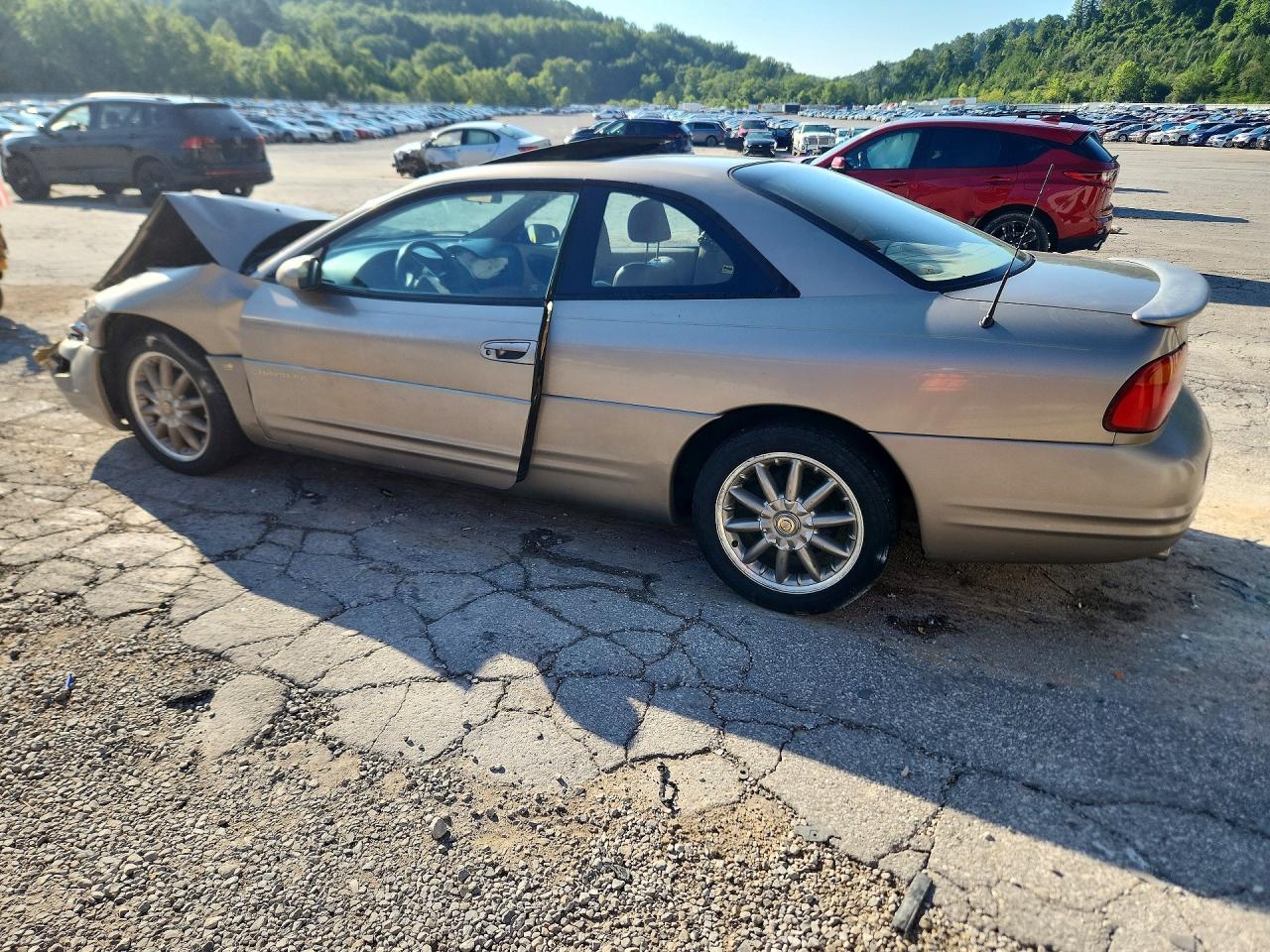 1999 Chrysler Sebring Lxi Gold vin: 4C3AU52NXXE092152