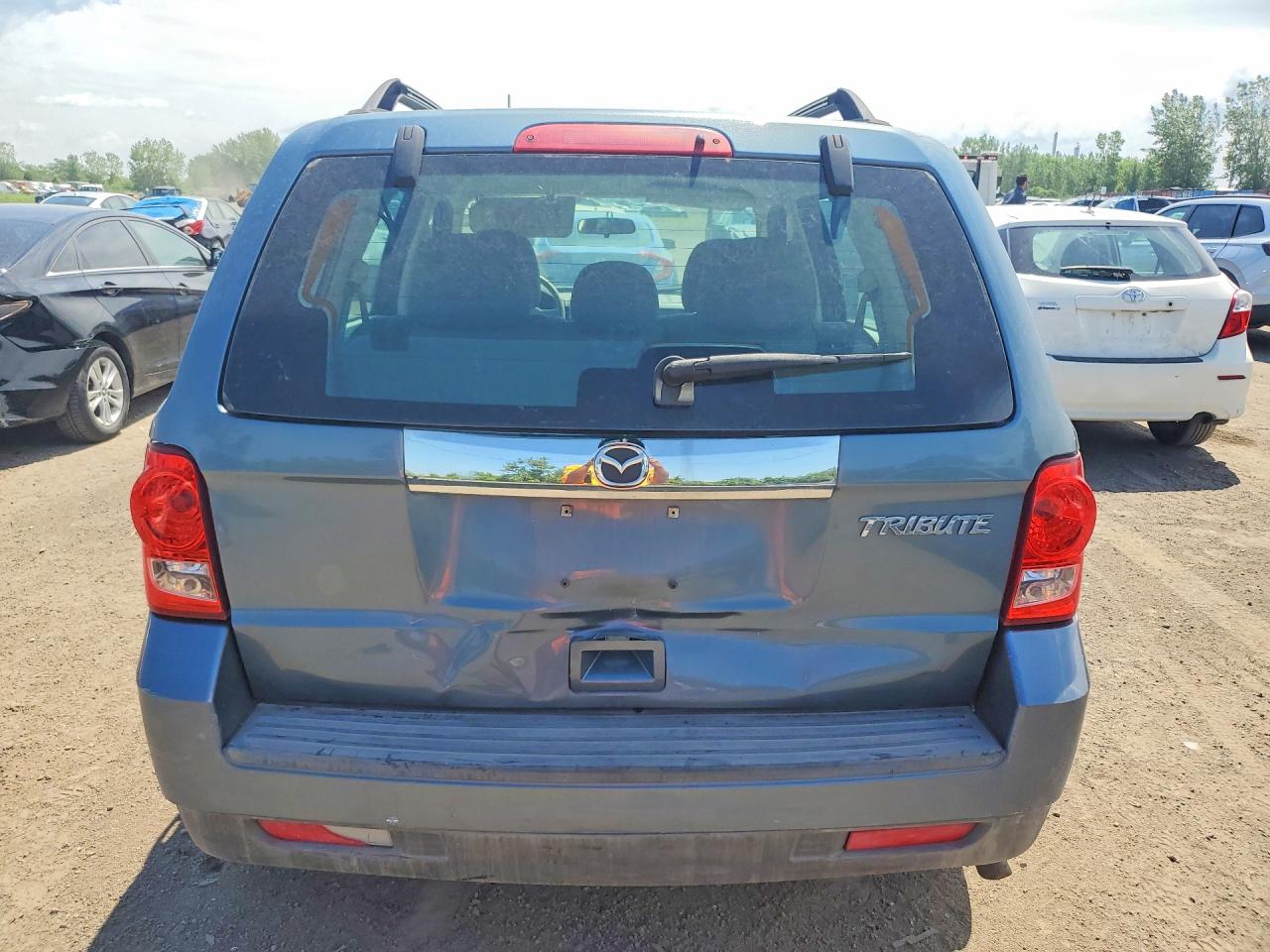 2010 Mazda Tribute I Blue vin: 4F2CY0C71AKM03859