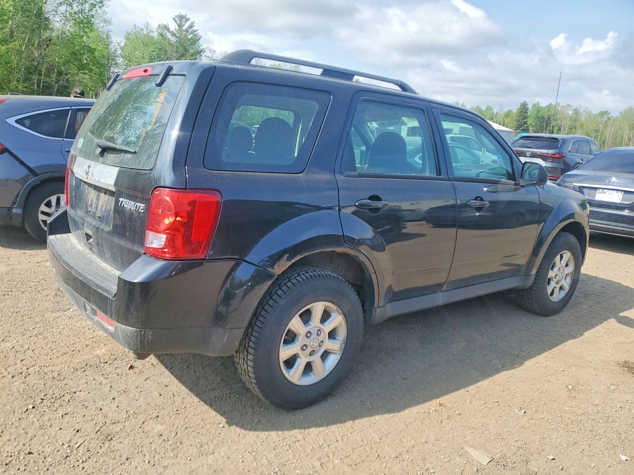 2011 Mazda Tribute I Черный vin: 4F2CY0C71BKM00946