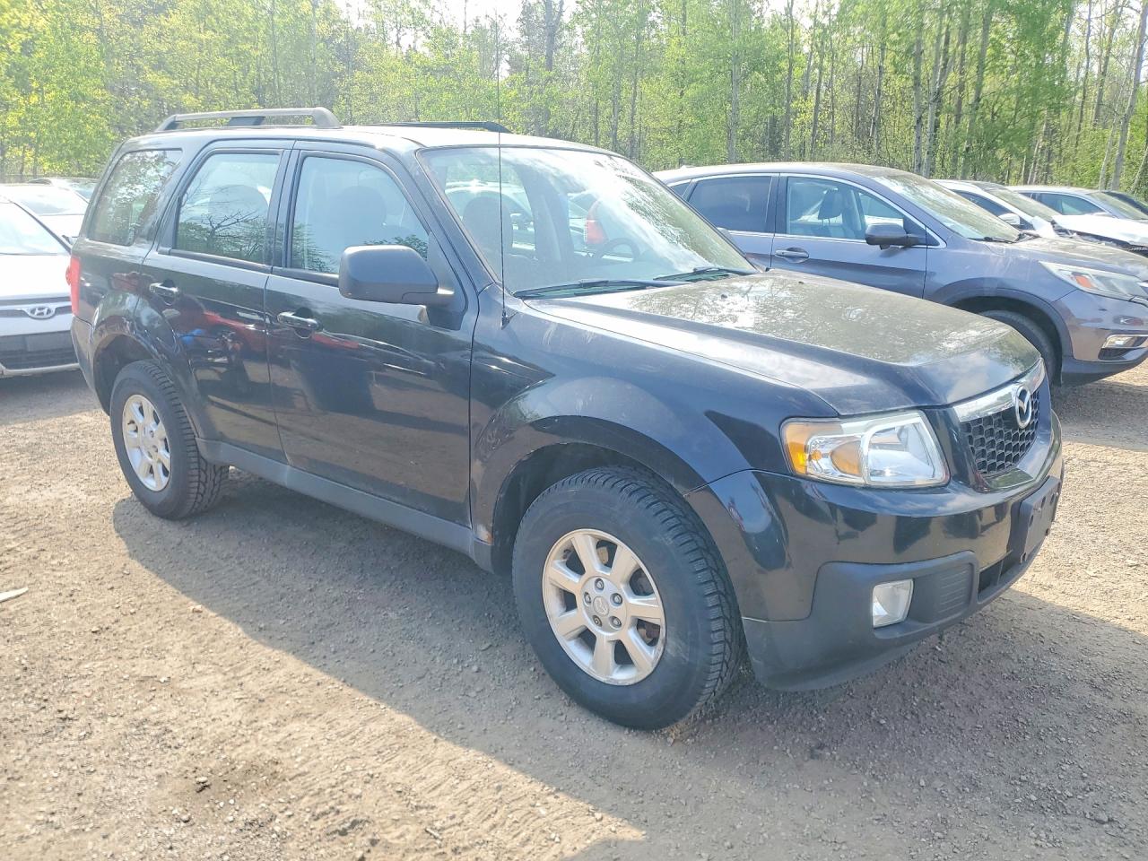 2011 Mazda Tribute I Черный vin: 4F2CY0C71BKM00946
