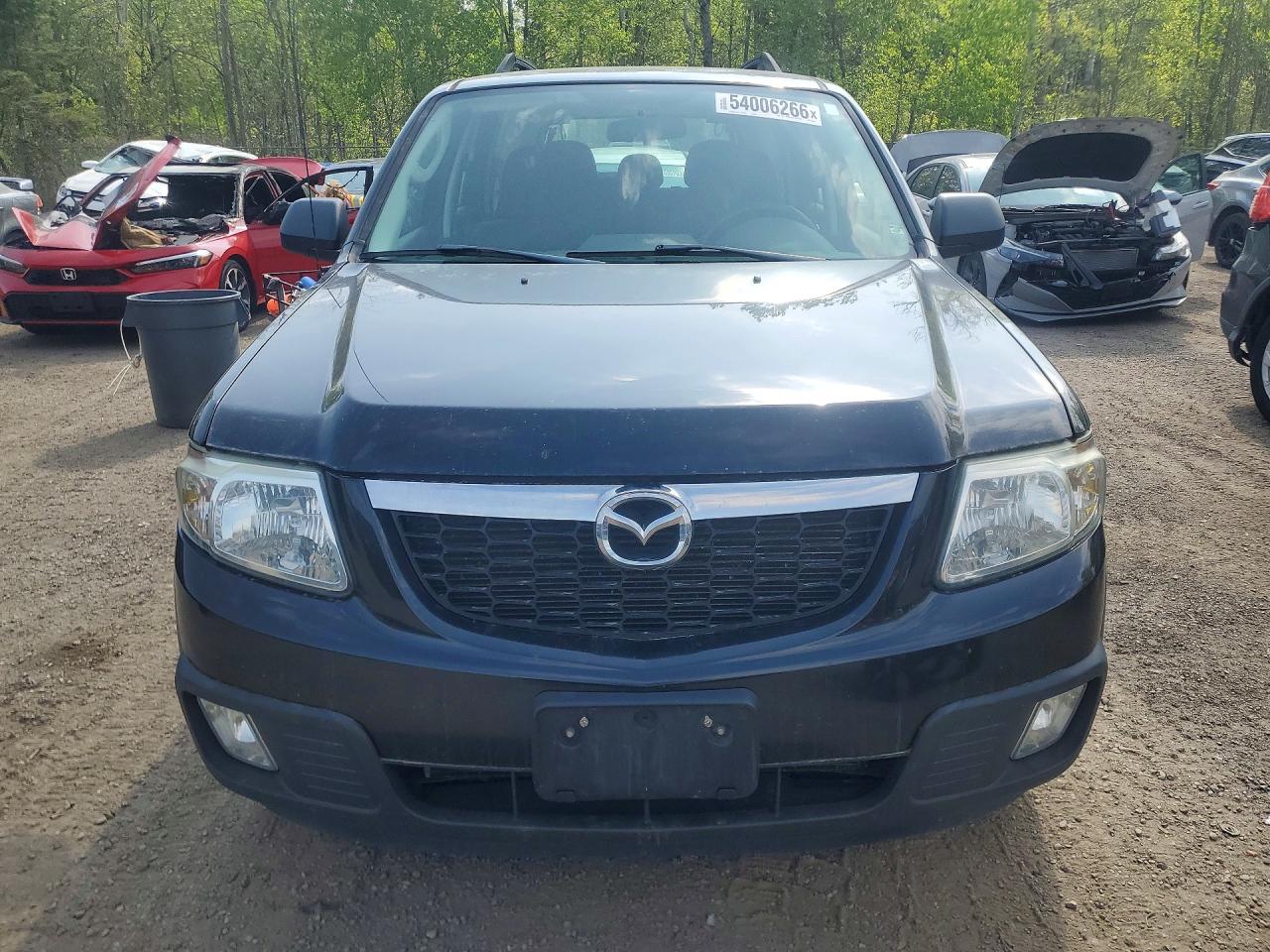 2011 Mazda Tribute I Черный vin: 4F2CY0C71BKM00946