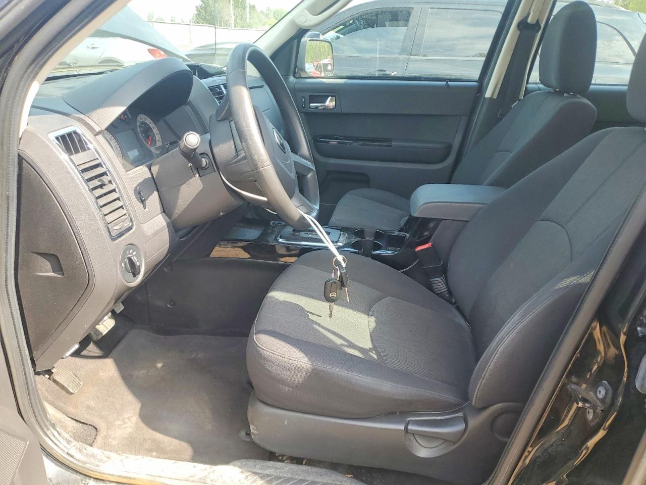 2011 Mazda Tribute I Черный vin: 4F2CY0C71BKM00946