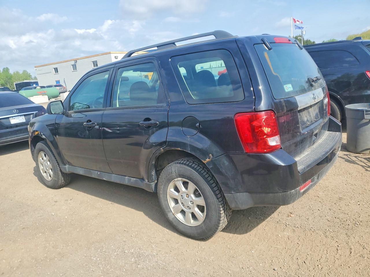 2011 Mazda Tribute I Черный vin: 4F2CY0C71BKM00946