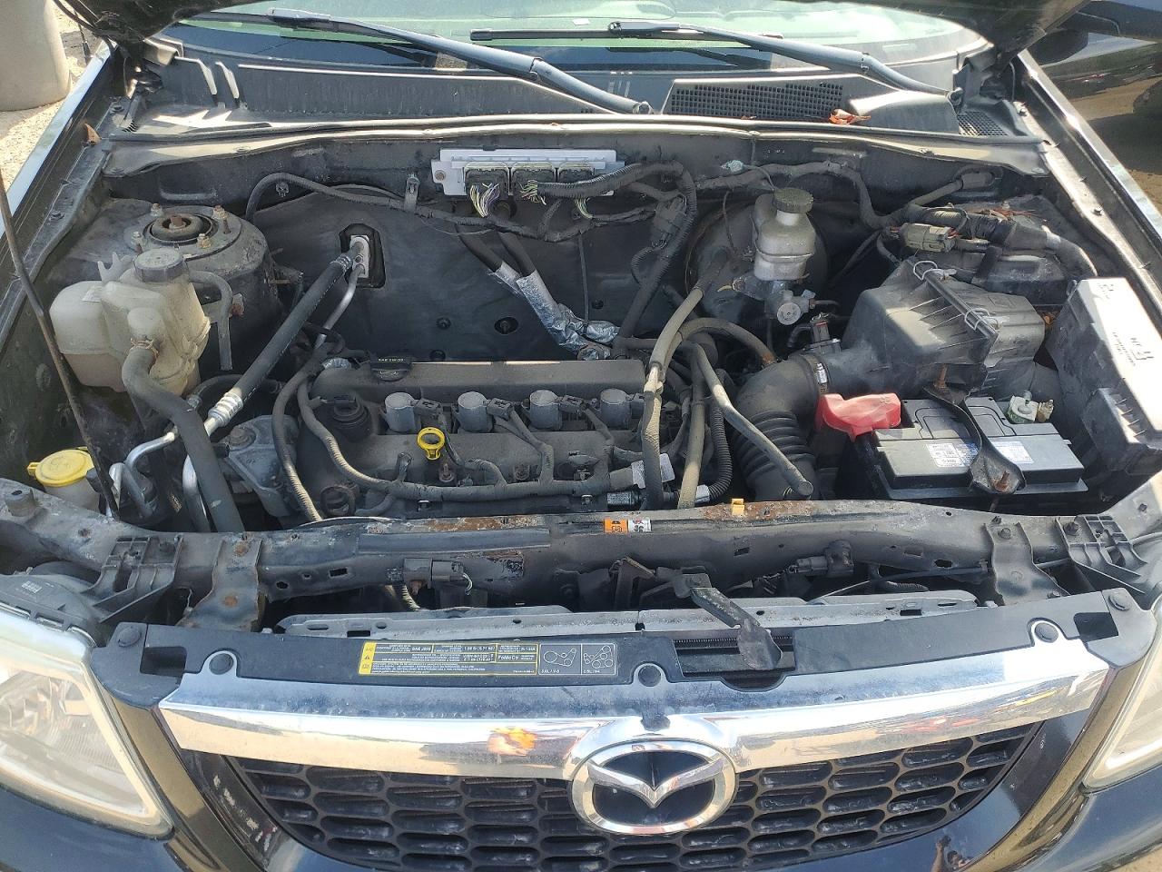 2011 Mazda Tribute I Черный vin: 4F2CY0C71BKM00946