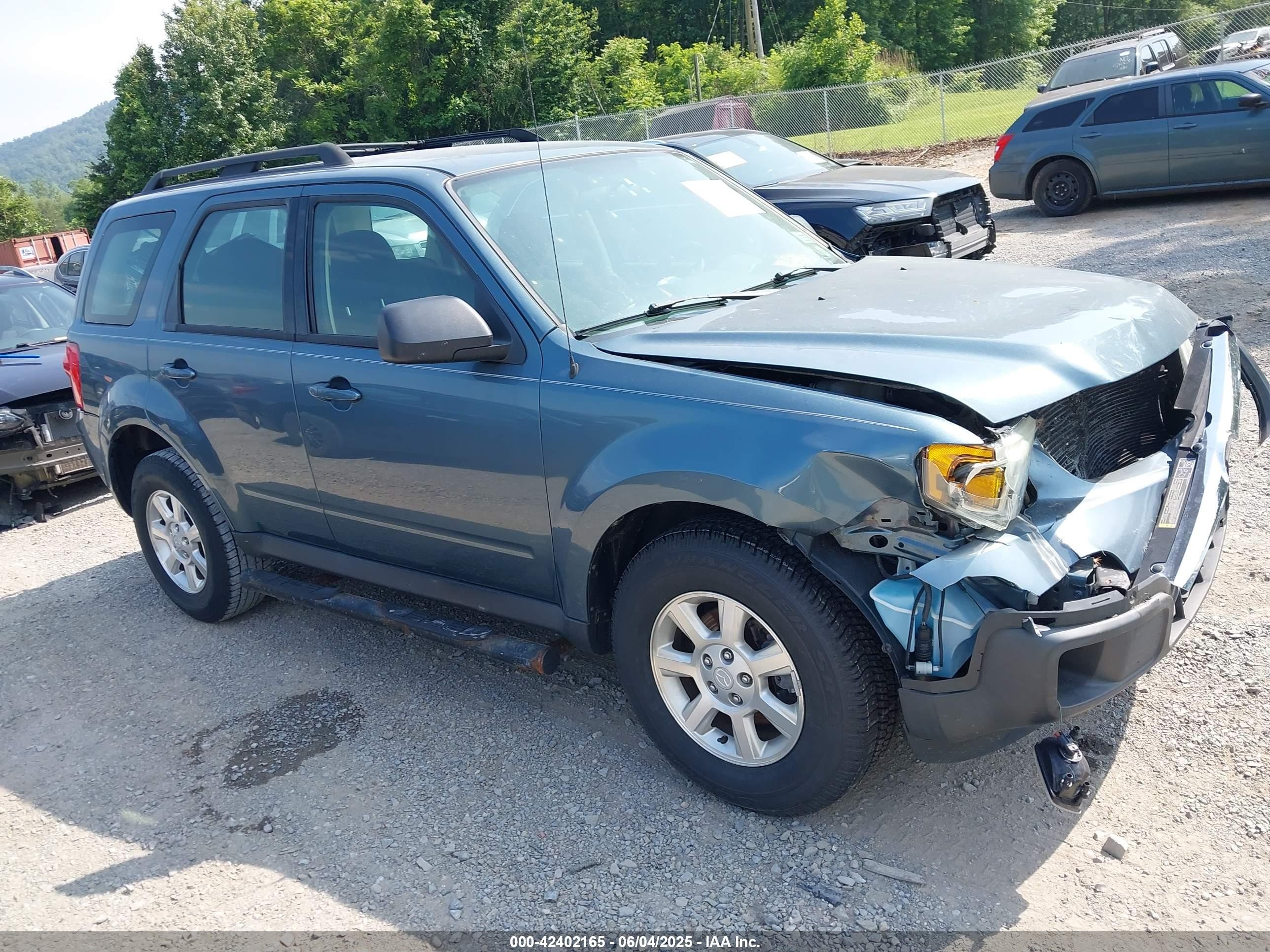 2011 Mazda Tribute I Sport Light Blue vin: 4F2CY0C72BKM04925