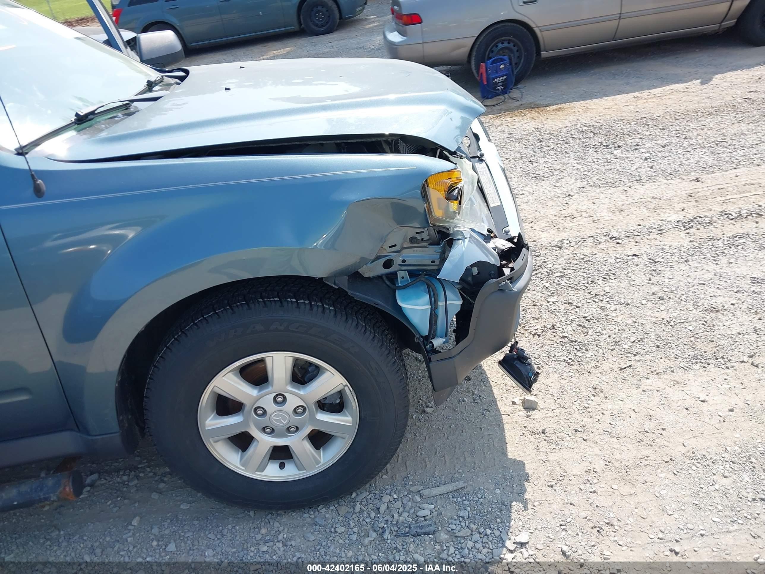 2011 Mazda Tribute I Sport Light Blue vin: 4F2CY0C72BKM04925