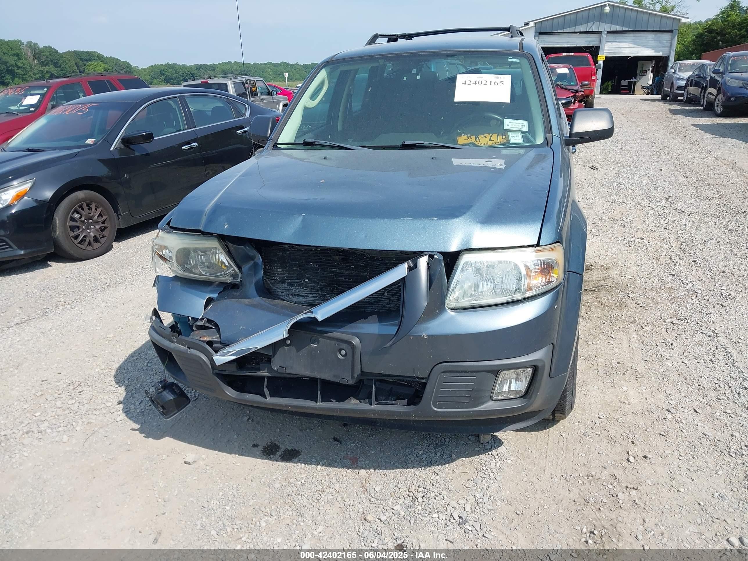 2011 Mazda Tribute I Sport Light Blue vin: 4F2CY0C72BKM04925