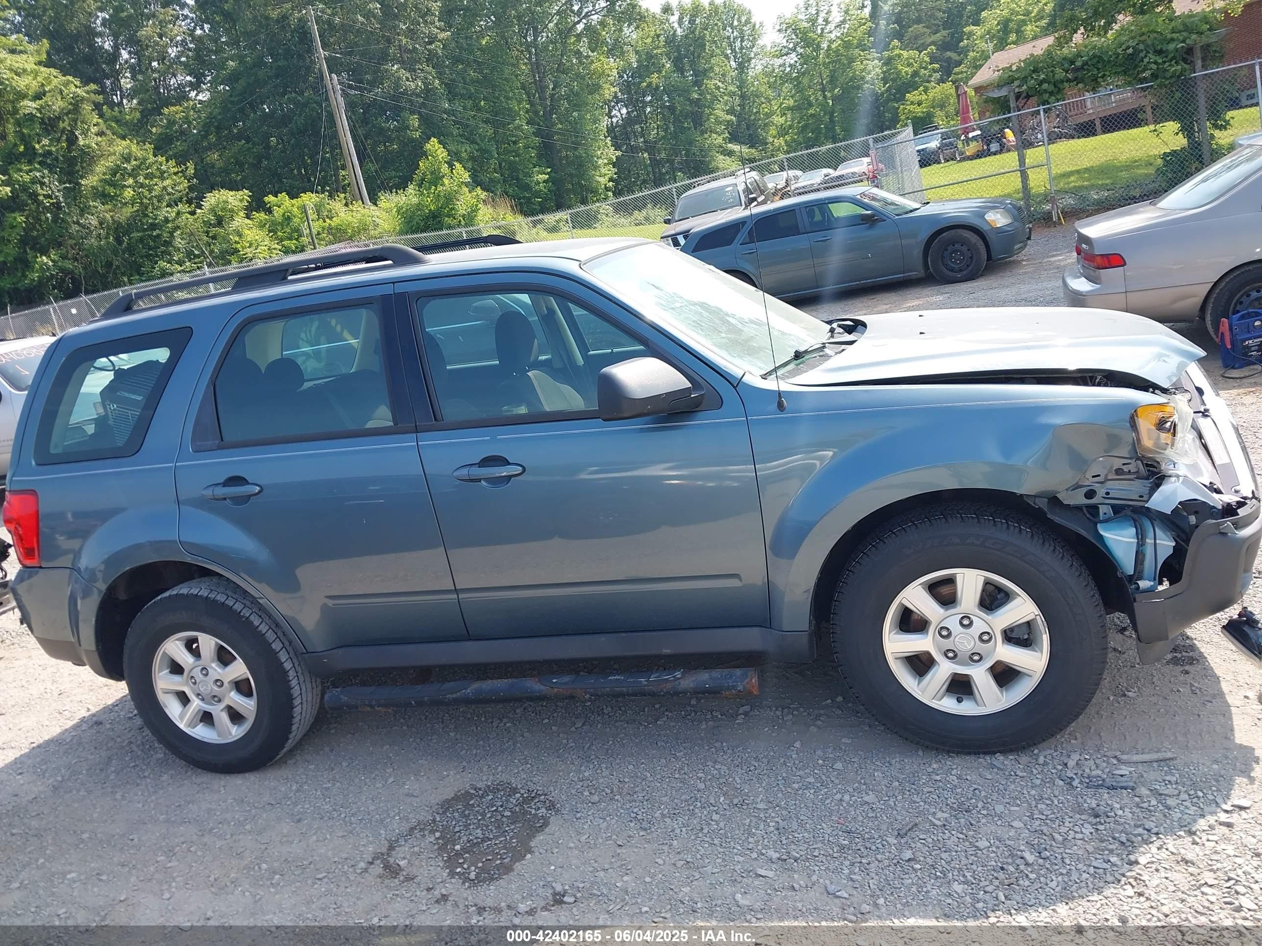 2011 Mazda Tribute I Sport Light Blue vin: 4F2CY0C72BKM04925