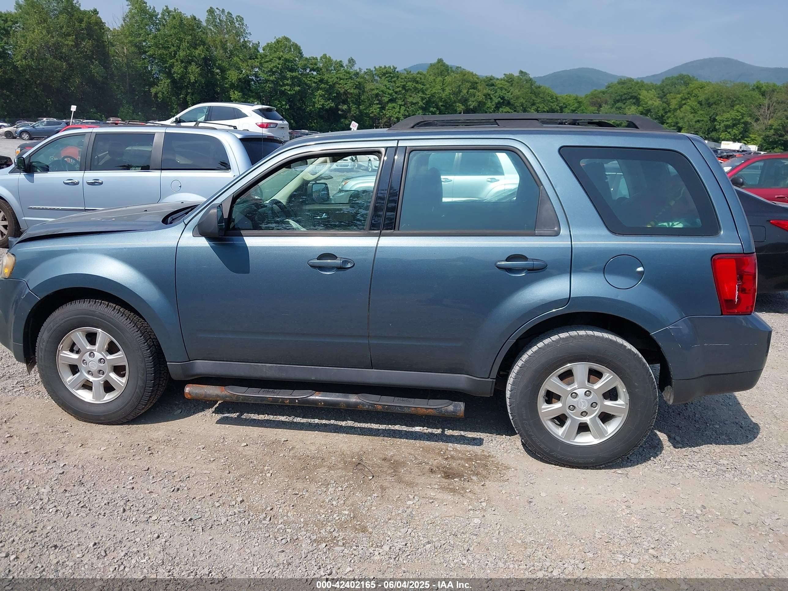 2011 Mazda Tribute I Sport Light Blue vin: 4F2CY0C72BKM04925