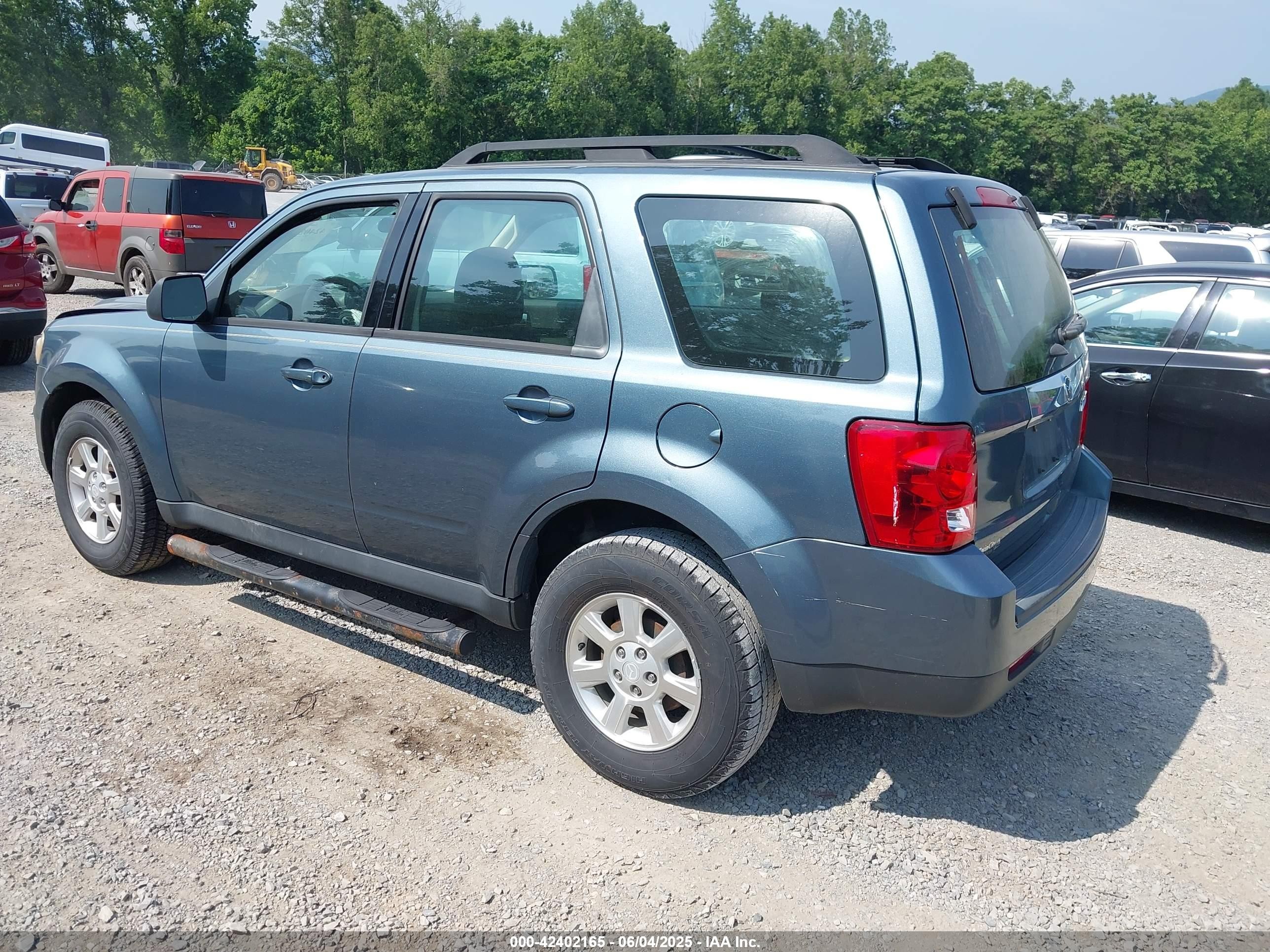 2011 Mazda Tribute I Sport Light Blue vin: 4F2CY0C72BKM04925