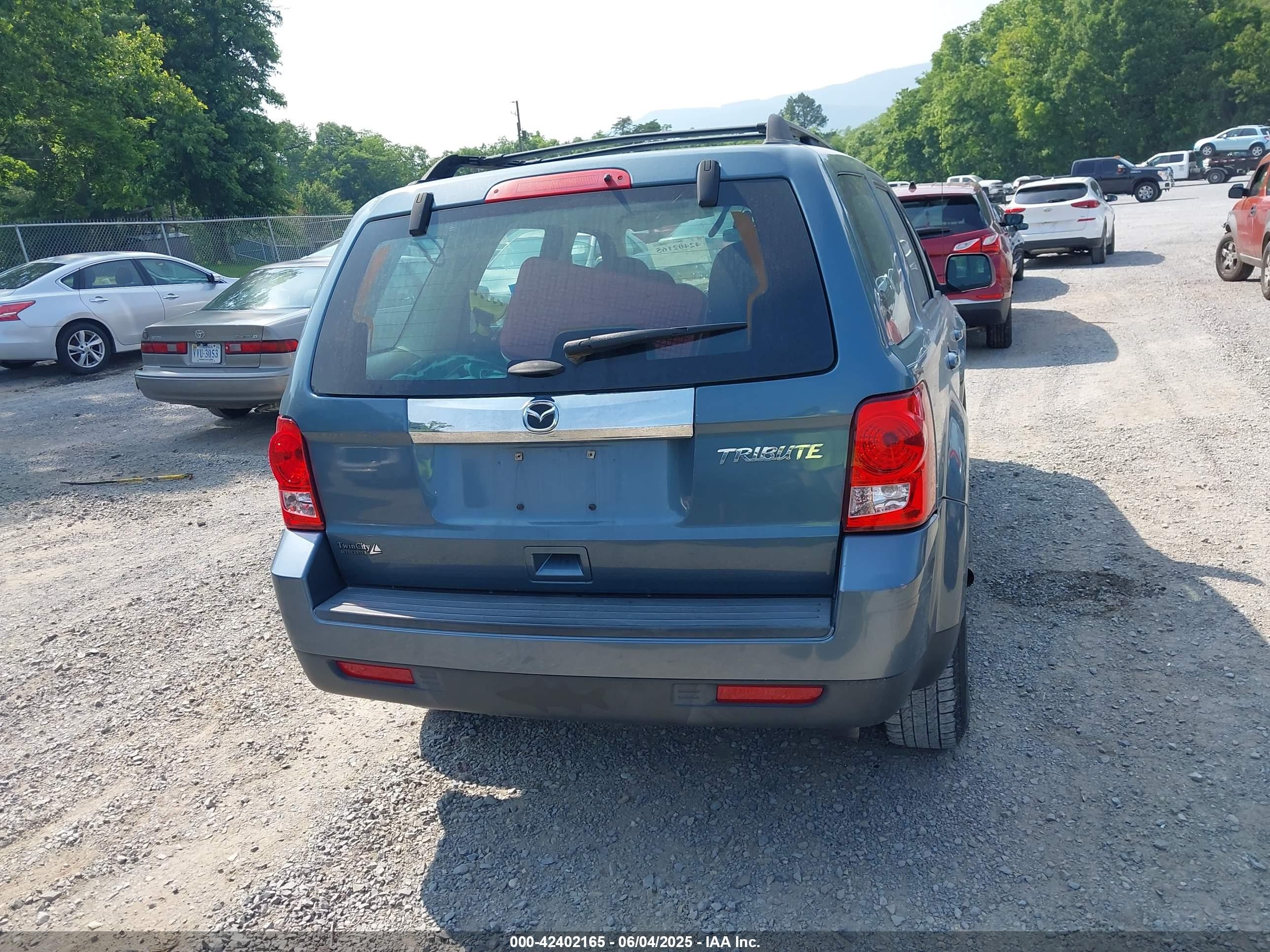2011 Mazda Tribute I Sport Light Blue vin: 4F2CY0C72BKM04925