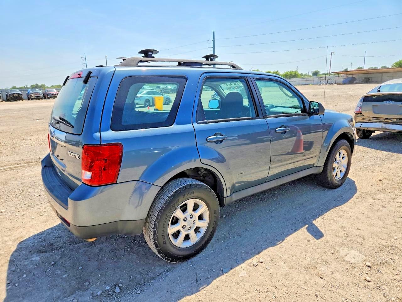 2011 Mazda Tribute I Бирюзовый vin: 4F2CY0C74BKM07017