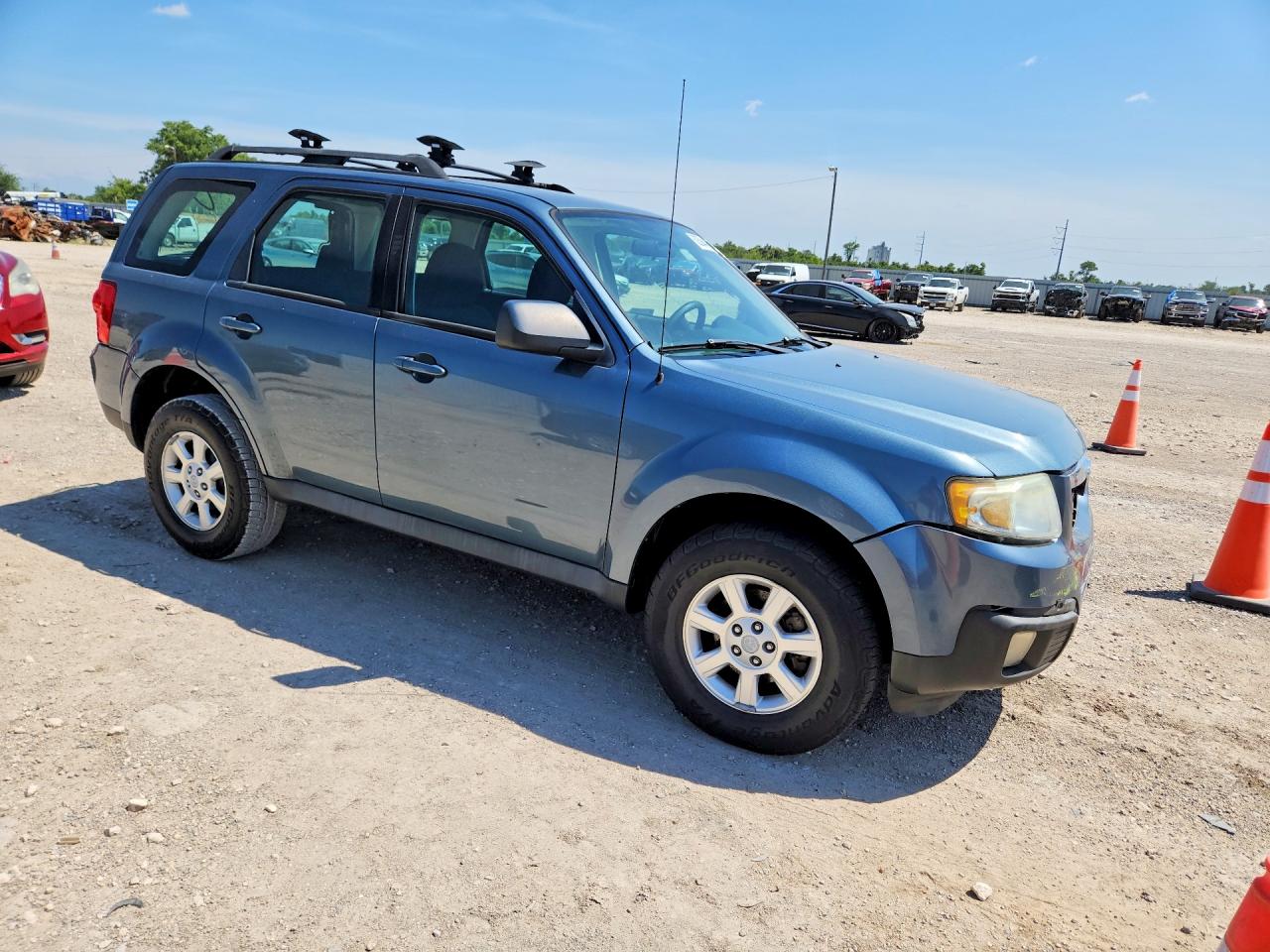 2011 Mazda Tribute I Бирюзовый vin: 4F2CY0C74BKM07017