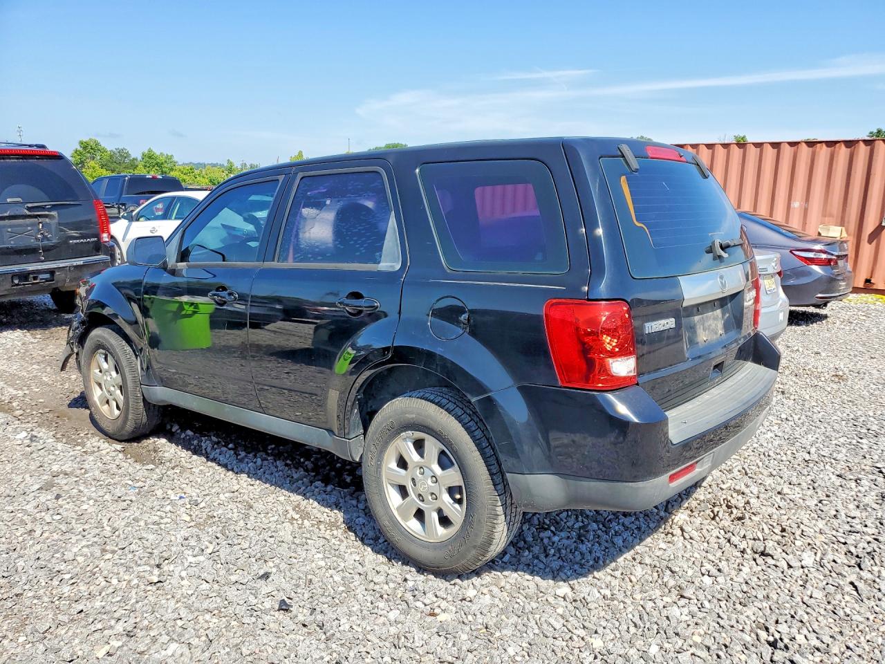 2010 Mazda Tribute I Черный vin: 4F2CY0C76AKM09284