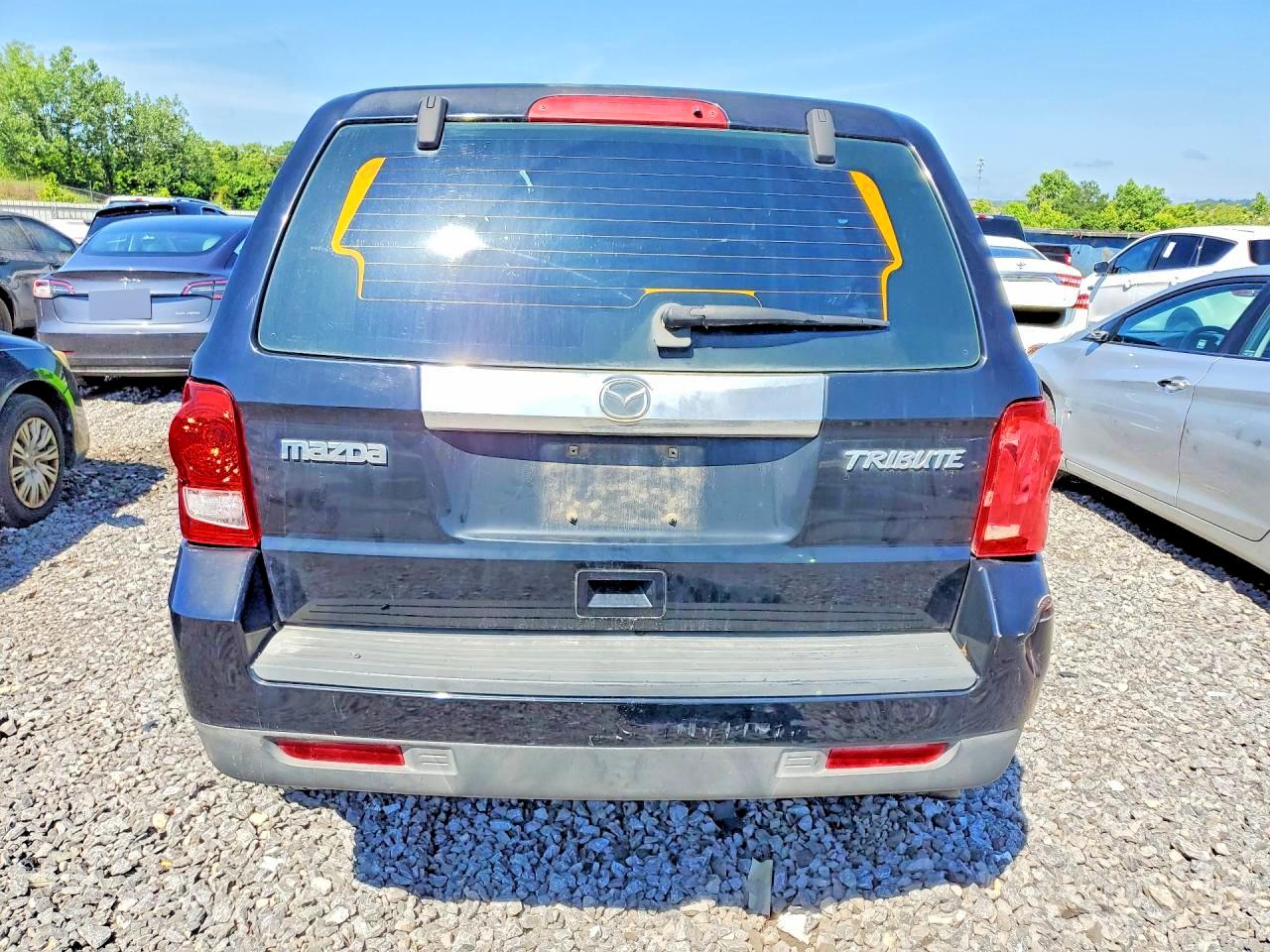2010 Mazda Tribute I Черный vin: 4F2CY0C76AKM09284