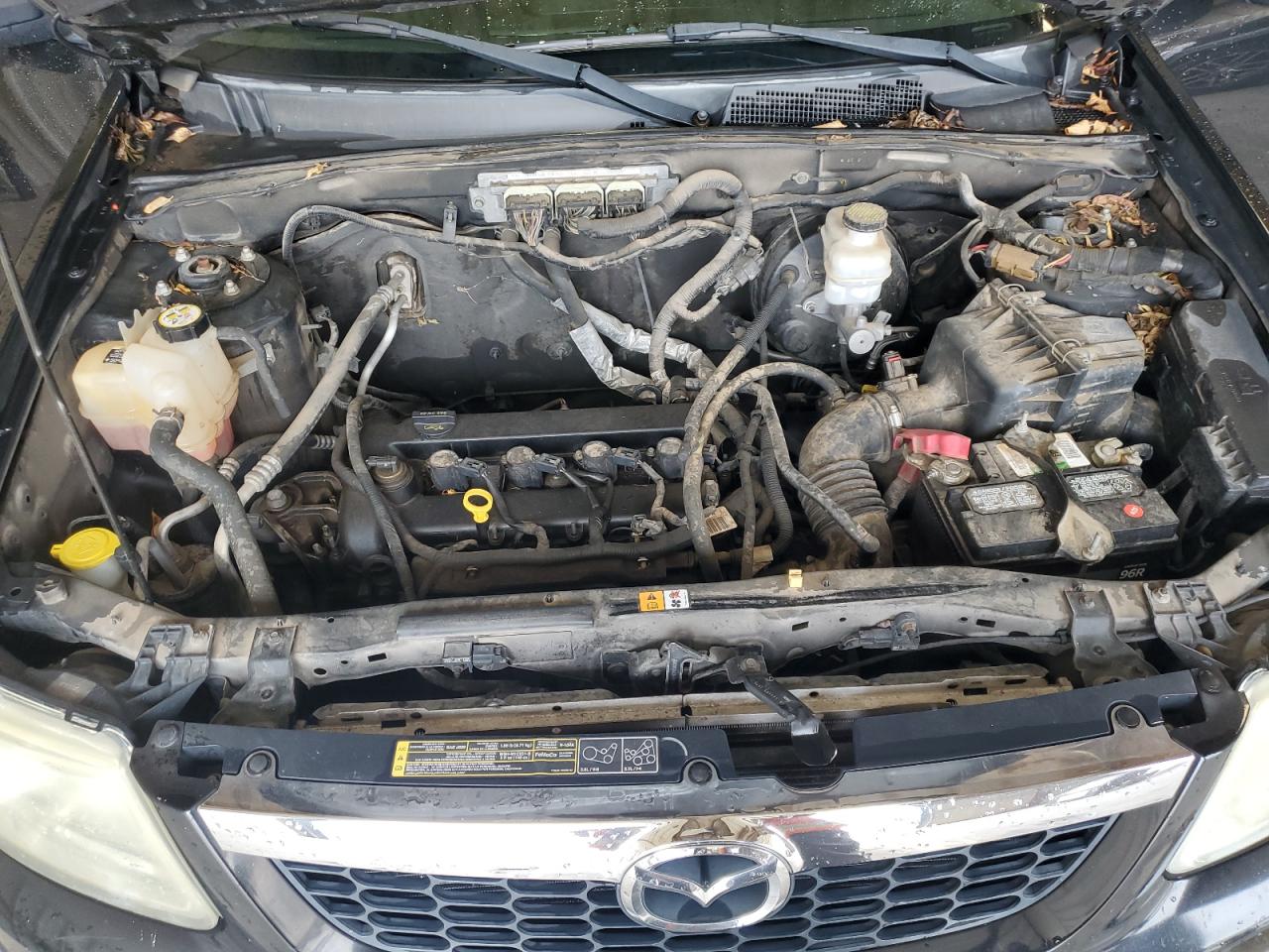 2011 Mazda Tribute I Черный vin: 4F2CY0C76BKM07102 Damage: Left Head Lamp, Faded, Repair Required