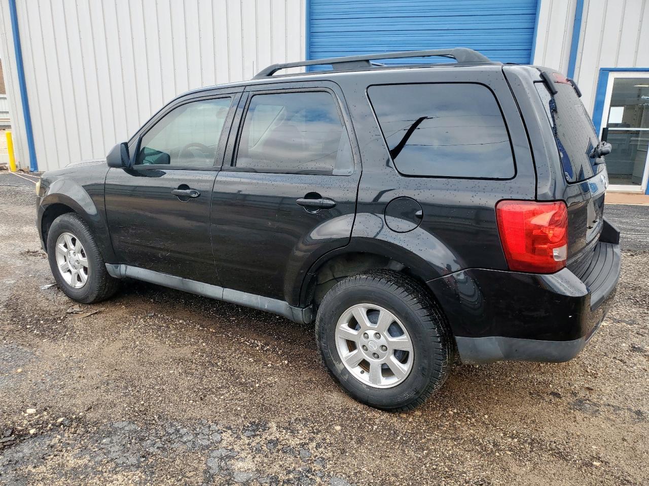 2011 Mazda Tribute I Черный vin: 4F2CY0C76BKM07102