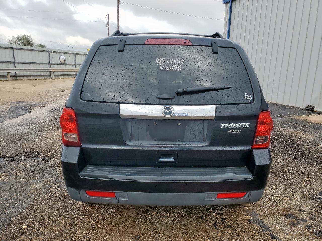 2011 Mazda Tribute I Черный vin: 4F2CY0C76BKM07102