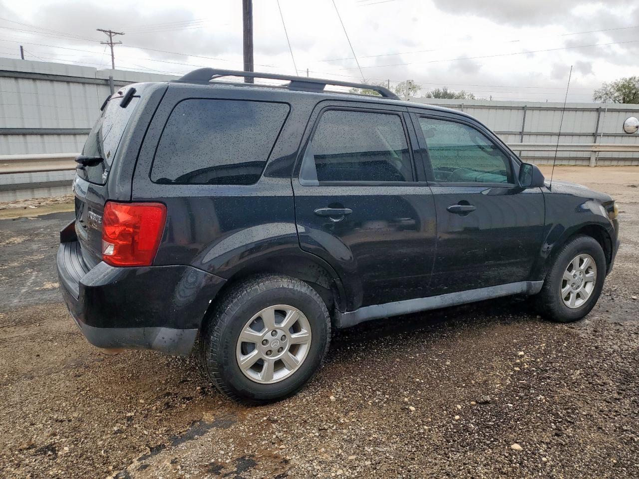 2011 Mazda Tribute I Черный vin: 4F2CY0C76BKM07102