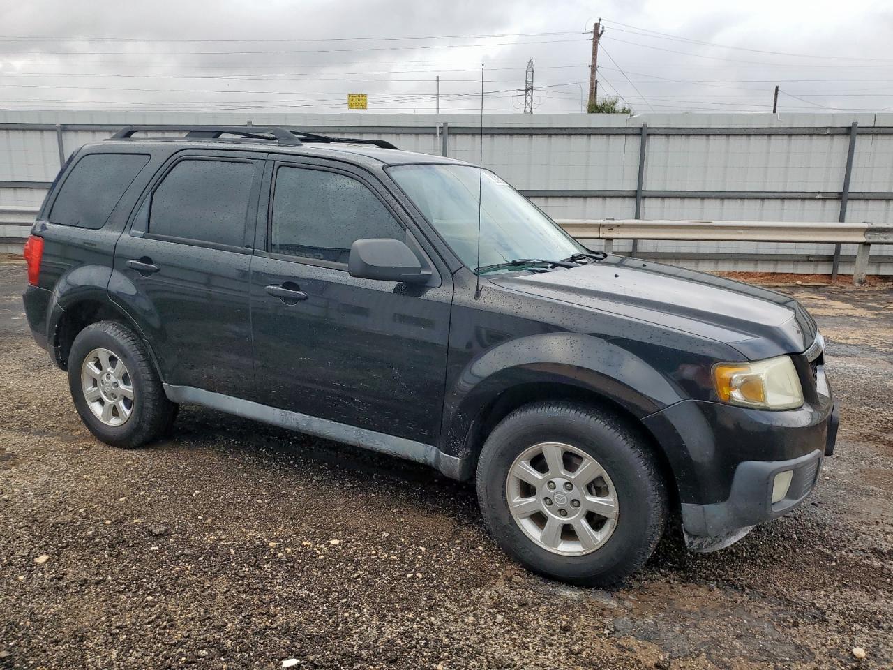 2011 Mazda Tribute I Черный vin: 4F2CY0C76BKM07102