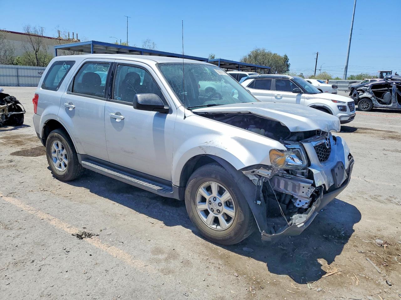 2011 Mazda Tribute I Серебряный vin: 4F2CY0C78BKM02287