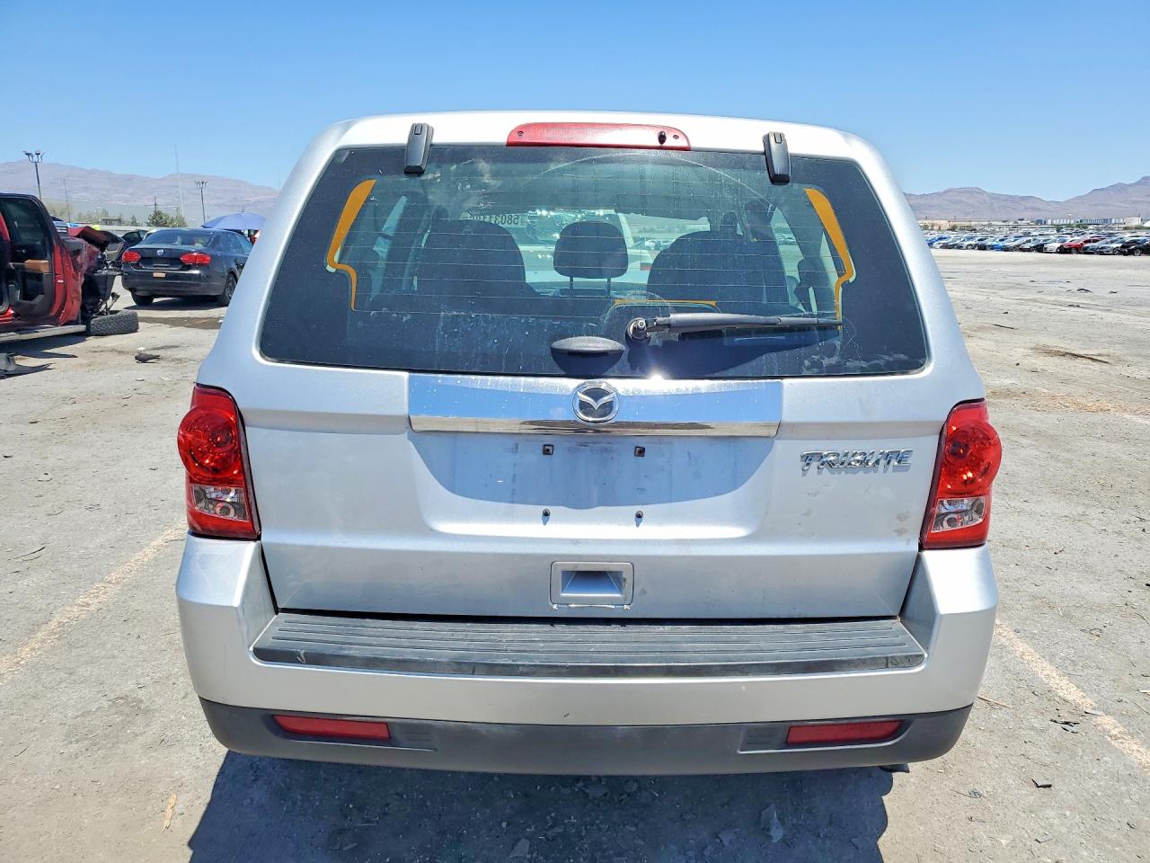 2011 Mazda Tribute I Серебряный vin: 4F2CY0C78BKM02287