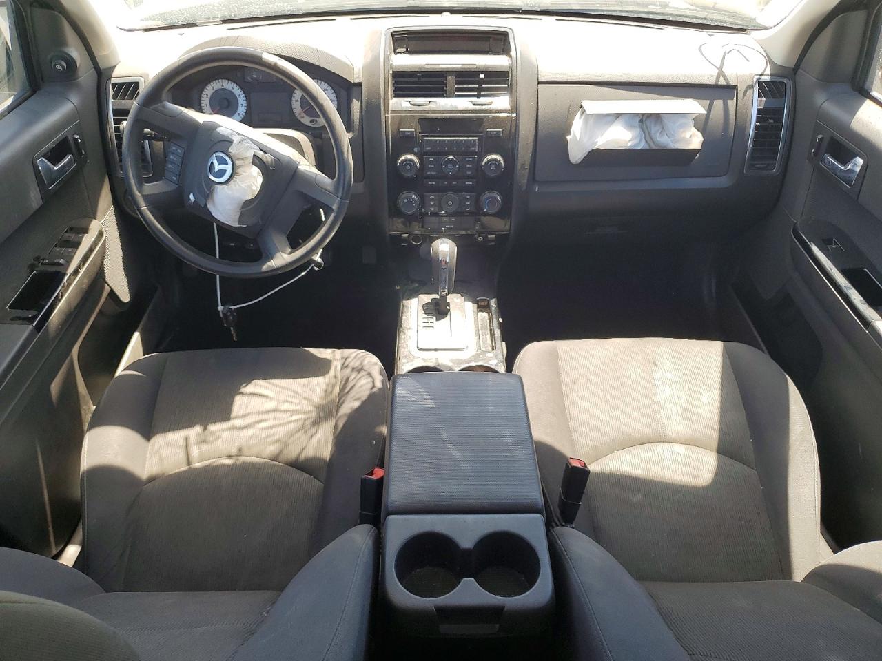 2011 Mazda Tribute I Серебряный vin: 4F2CY0C78BKM02287