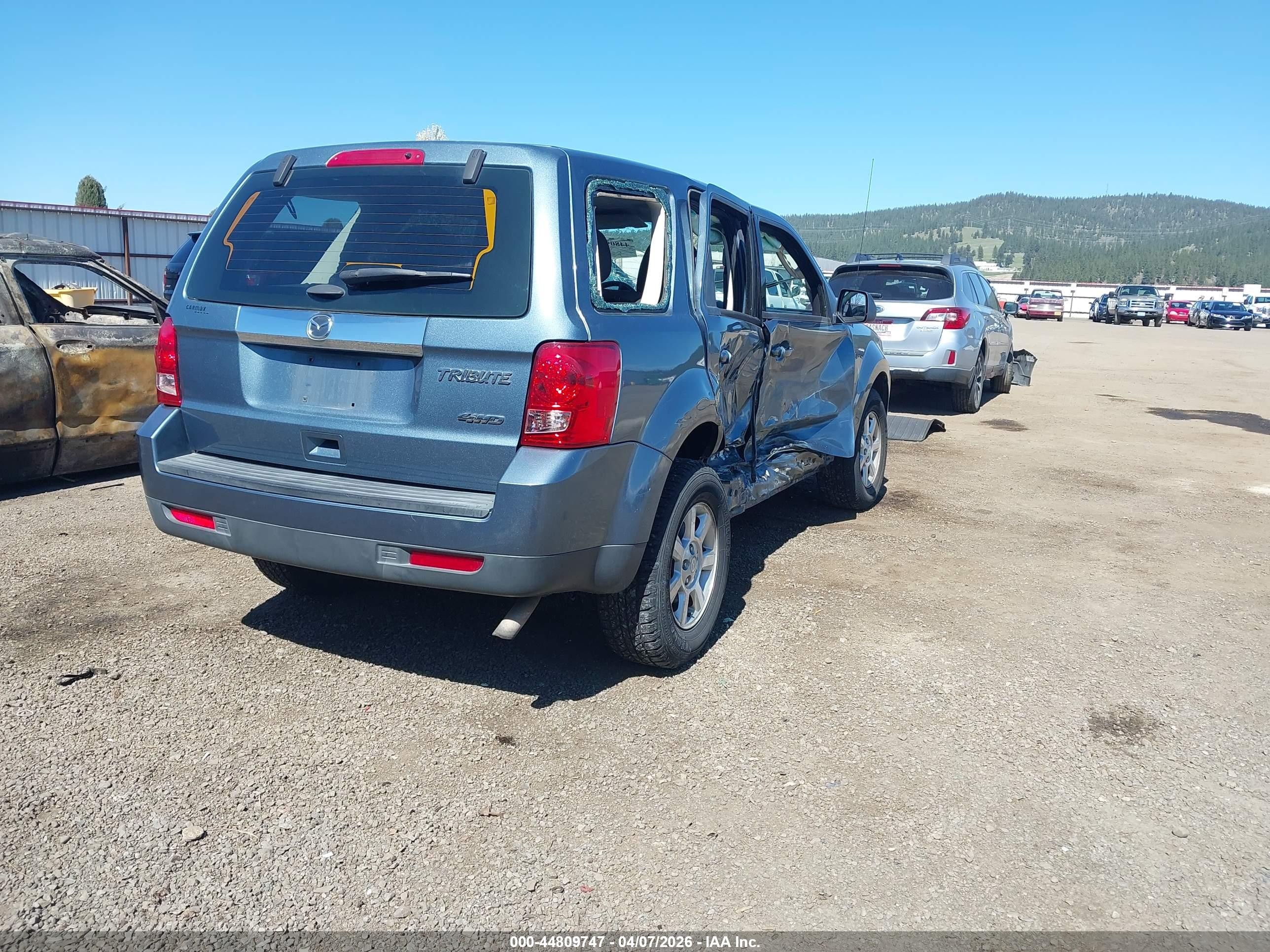 2011 Mazda Tribute   Blue vin: 4F2CY9C74BKM07457