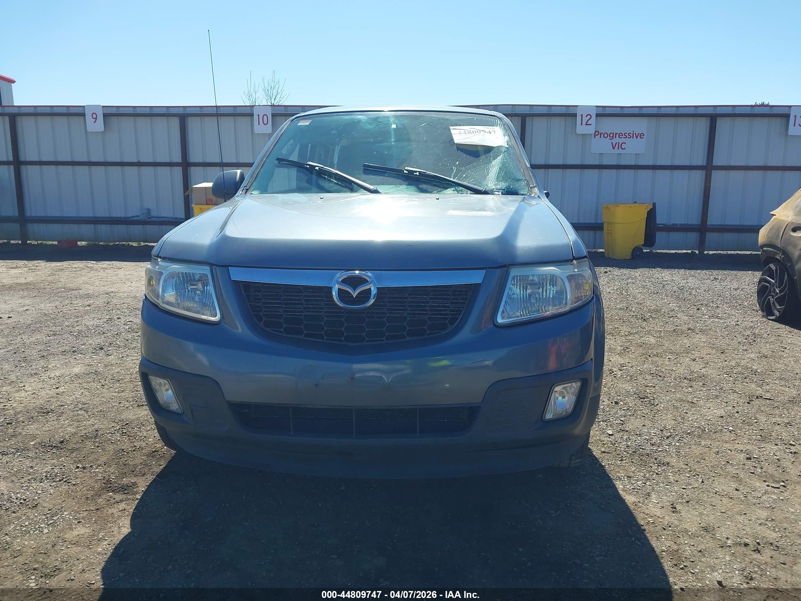 2011 Mazda Tribute   Blue vin: 4F2CY9C74BKM07457