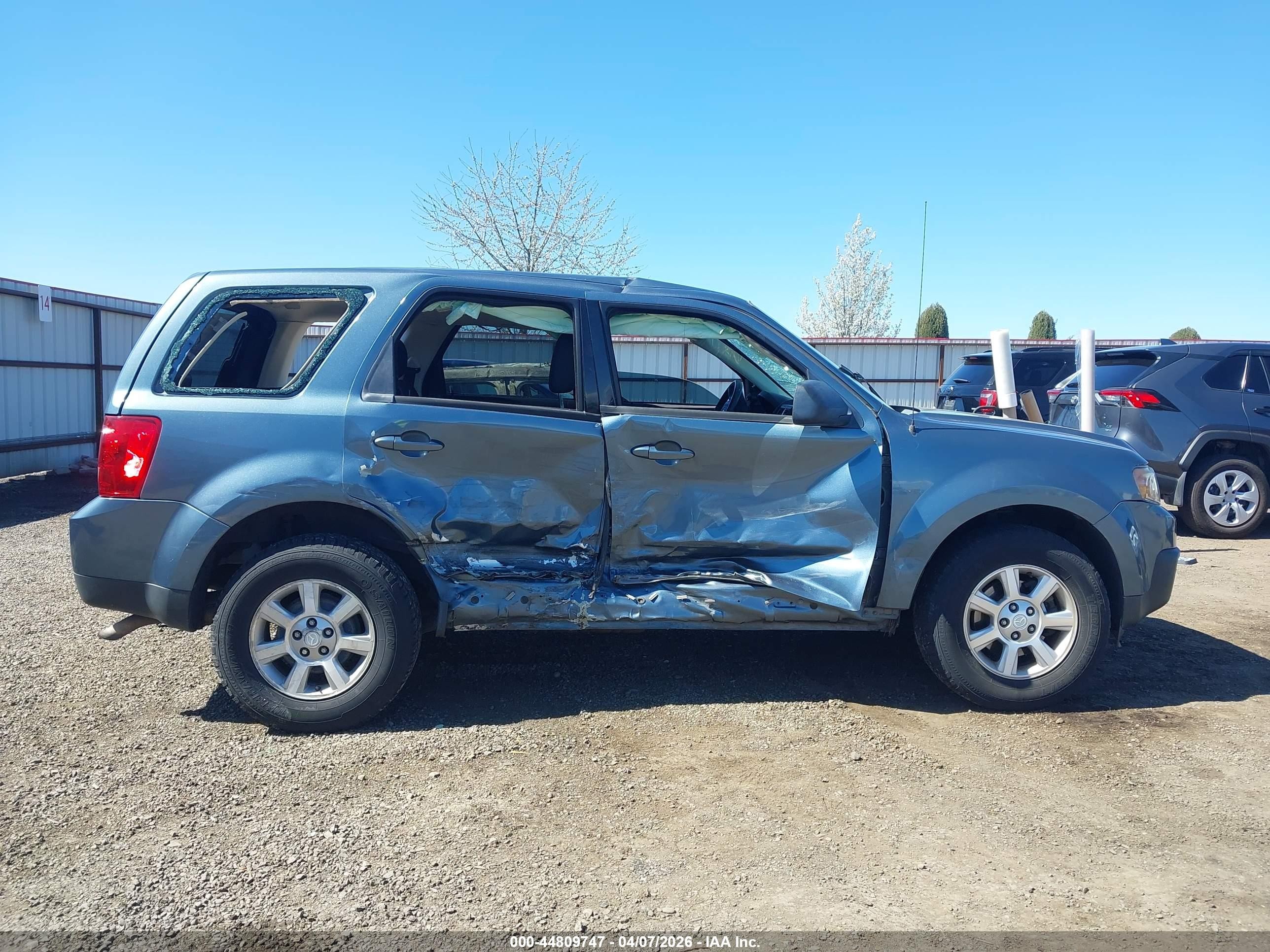 2011 Mazda Tribute   Blue vin: 4F2CY9C74BKM07457