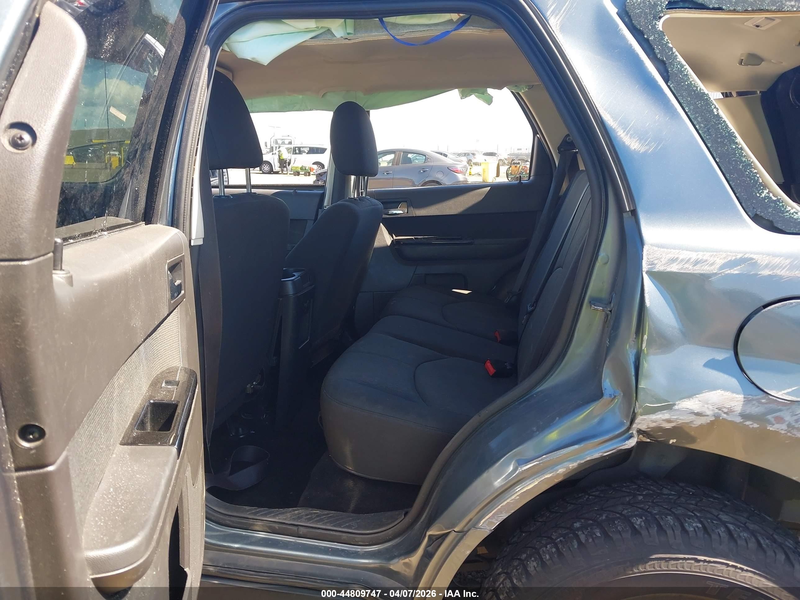 2011 Mazda Tribute   Blue vin: 4F2CY9C74BKM07457
