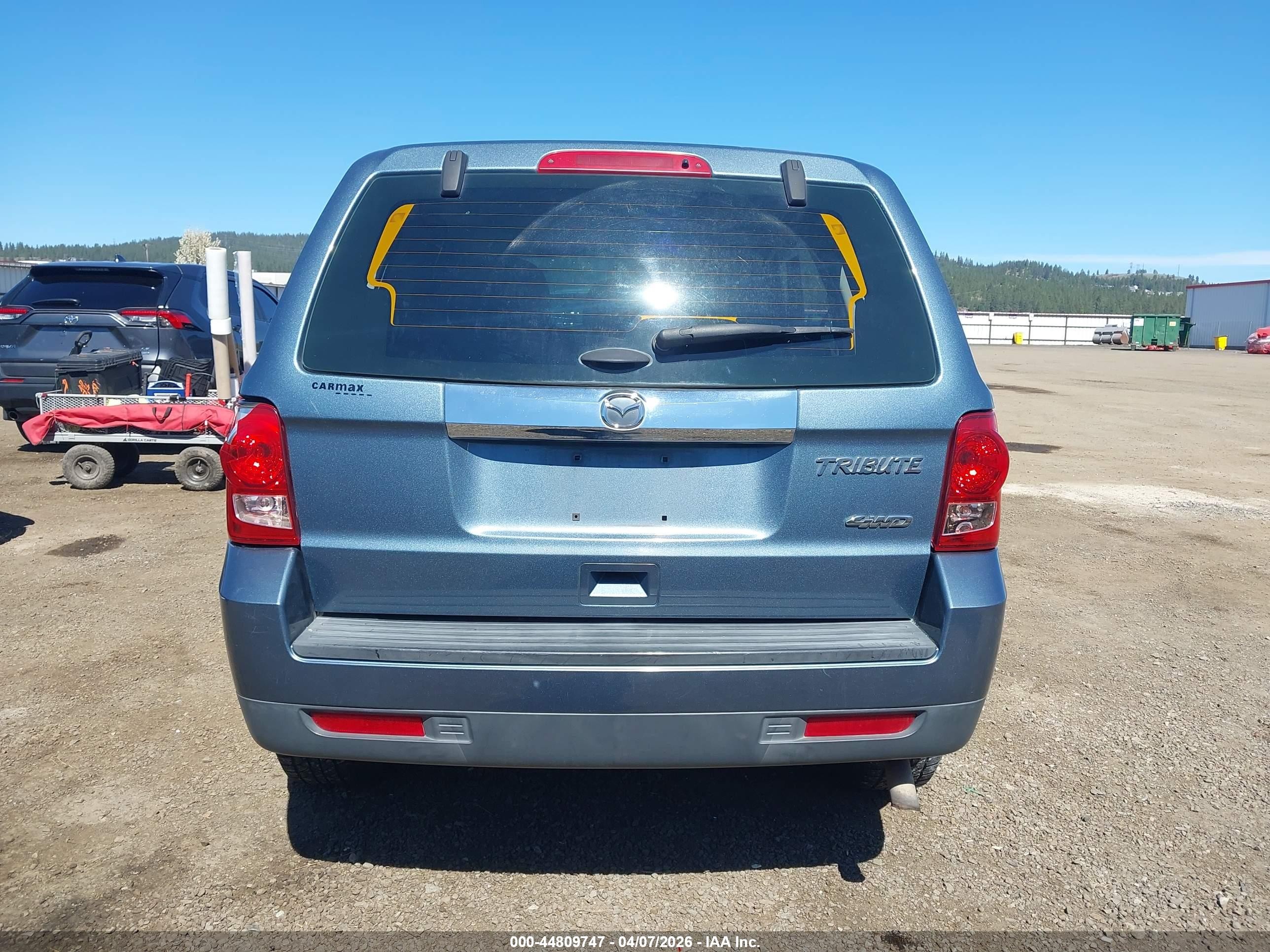 2011 Mazda Tribute   Blue vin: 4F2CY9C74BKM07457