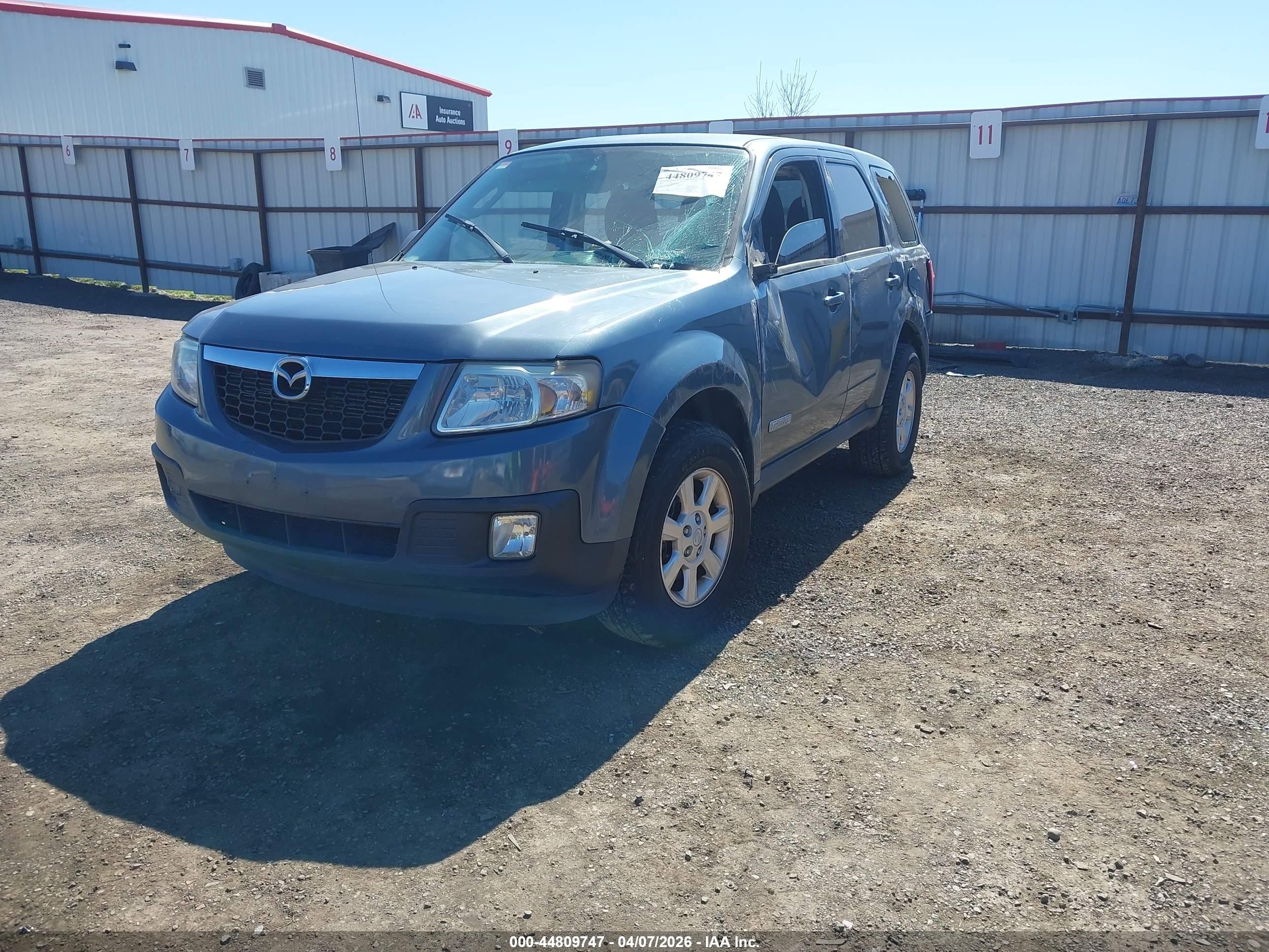 2011 Mazda Tribute   Blue vin: 4F2CY9C74BKM07457