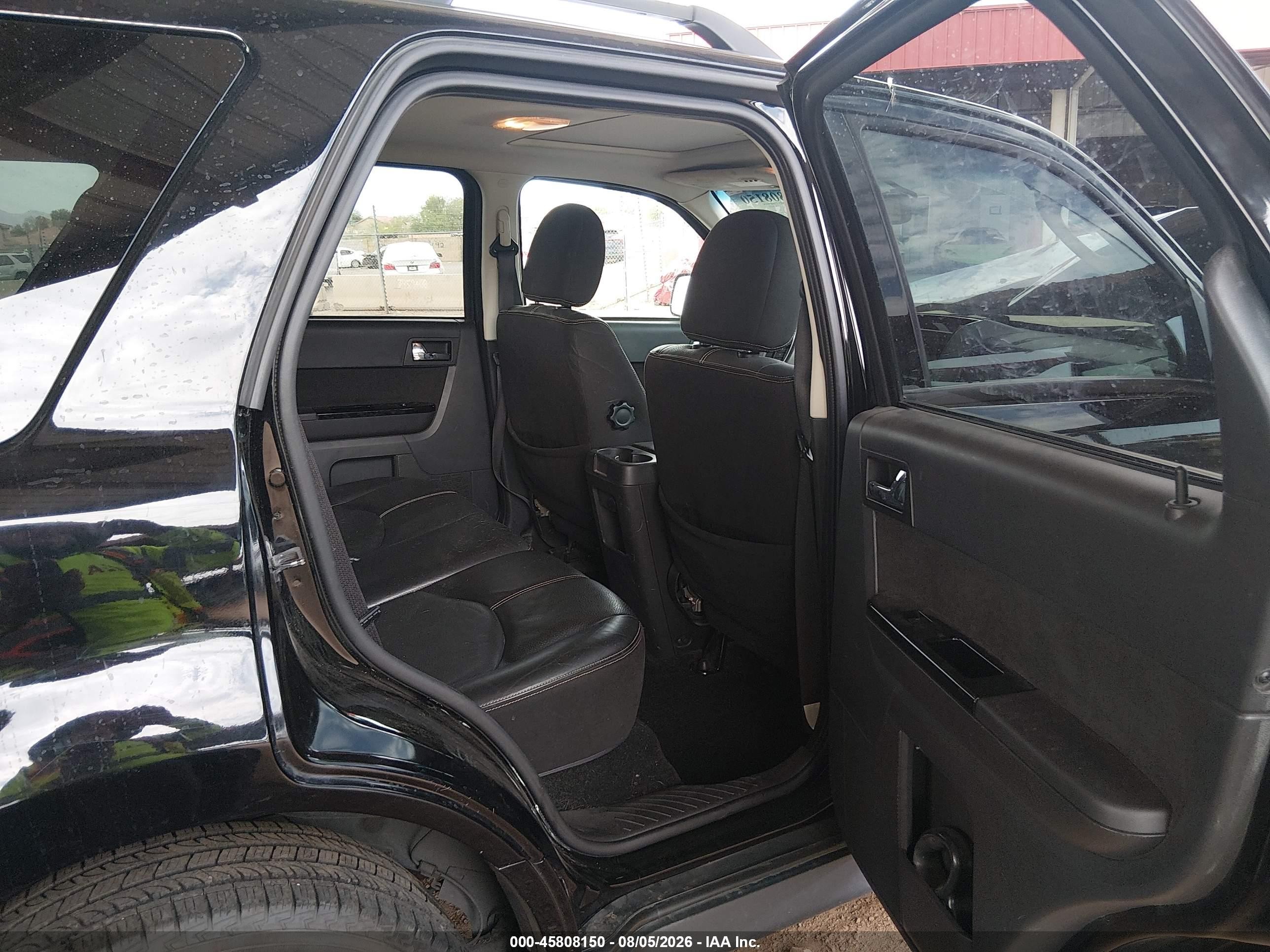 2010 Mazda Tribute S Grand Touring Black vin: 4F2CY9GG7AKM01404