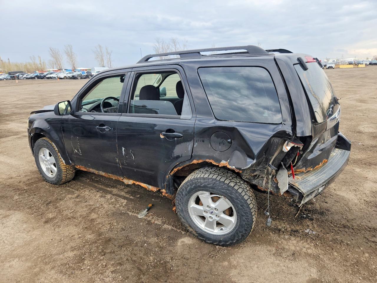 2009 Mazda Tribute I Черный vin: 4F2CZ02729KM01273