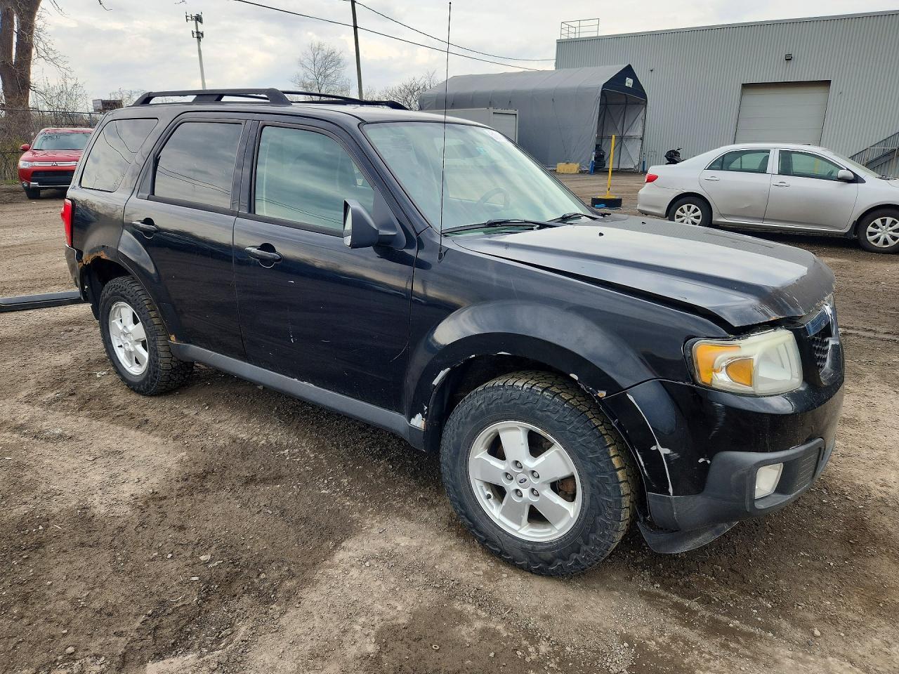 2009 Mazda Tribute I Черный vin: 4F2CZ02729KM01273