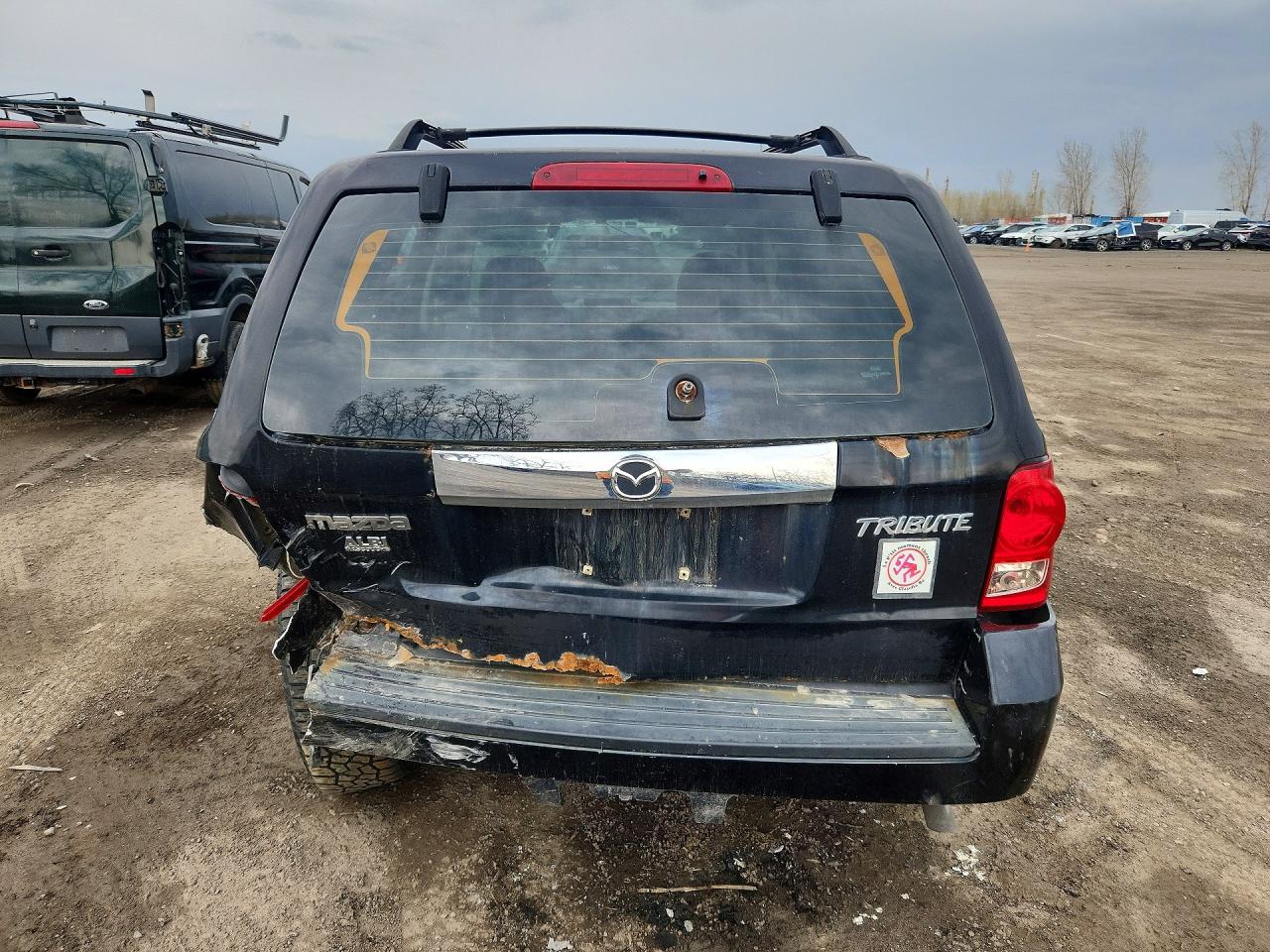 2009 Mazda Tribute I Черный vin: 4F2CZ02729KM01273
