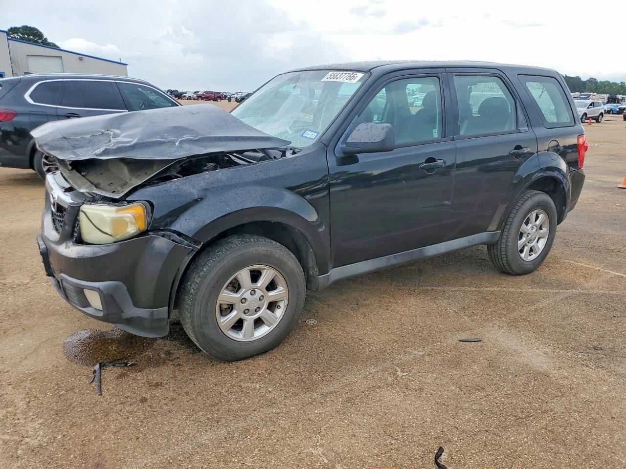 2009 Mazda Tribute I Черный vin: 4F2CZ02739KM09348