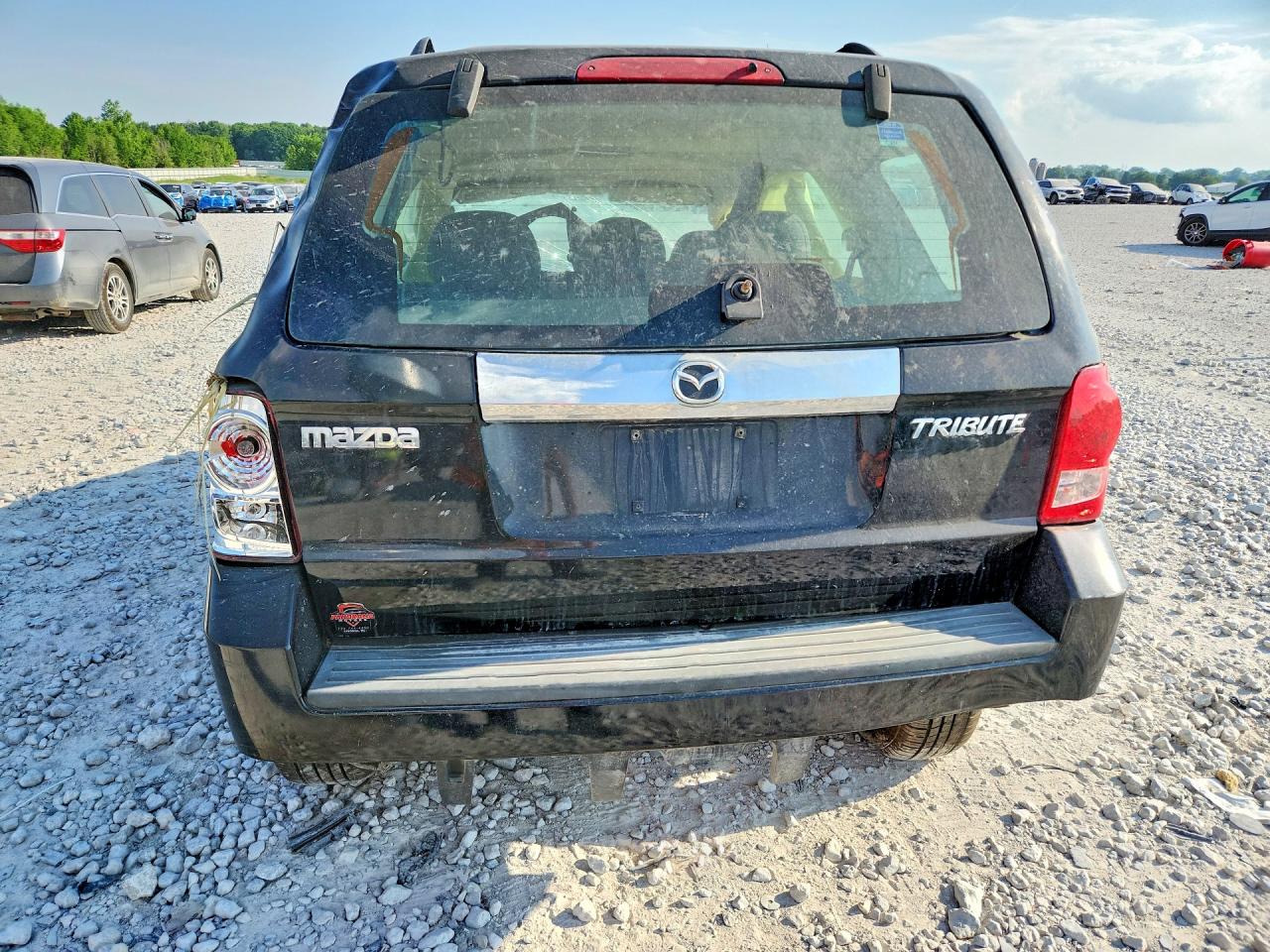 2008 Mazda Tribute I Черный vin: 4F2CZ02Z28KM18025