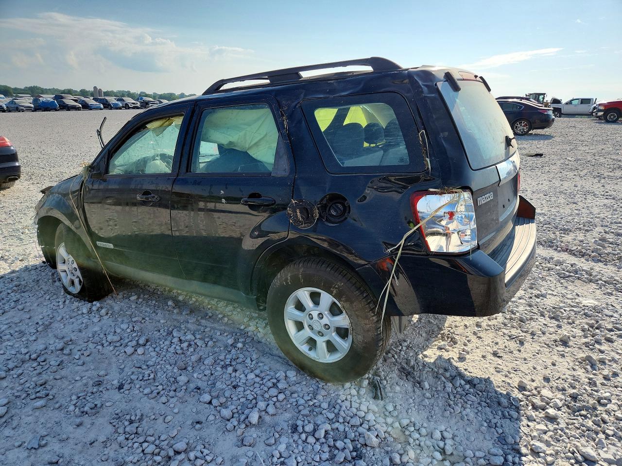 2008 Mazda Tribute I Черный vin: 4F2CZ02Z28KM18025