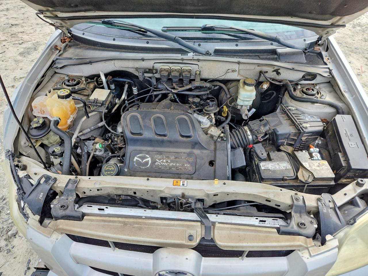 2005 Mazda Tribute S Серебряный vin: 4F2CZ04115KM35868