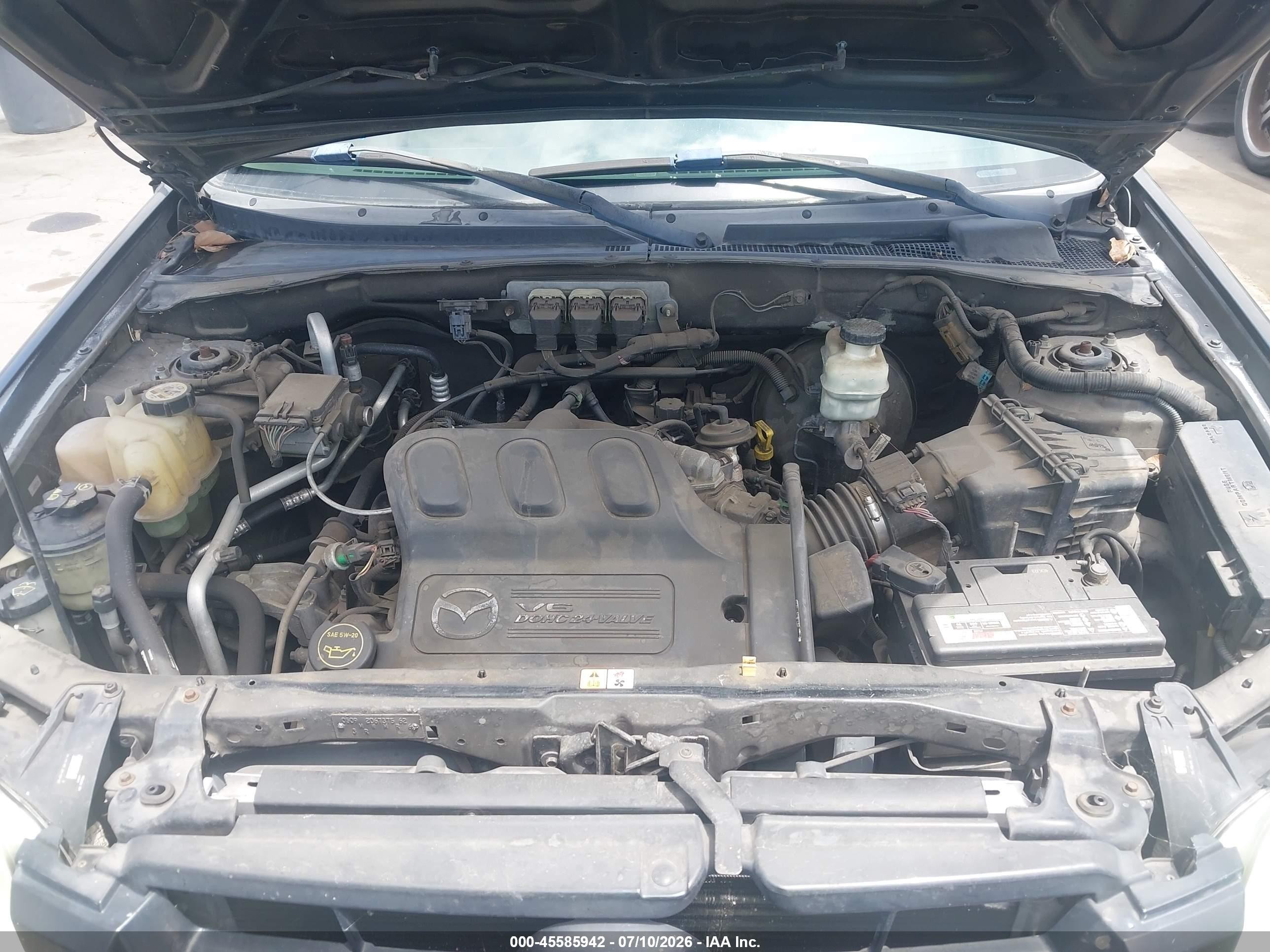 2006 Mazda Tribute S Синий vin: 4F2CZ06116KM02223