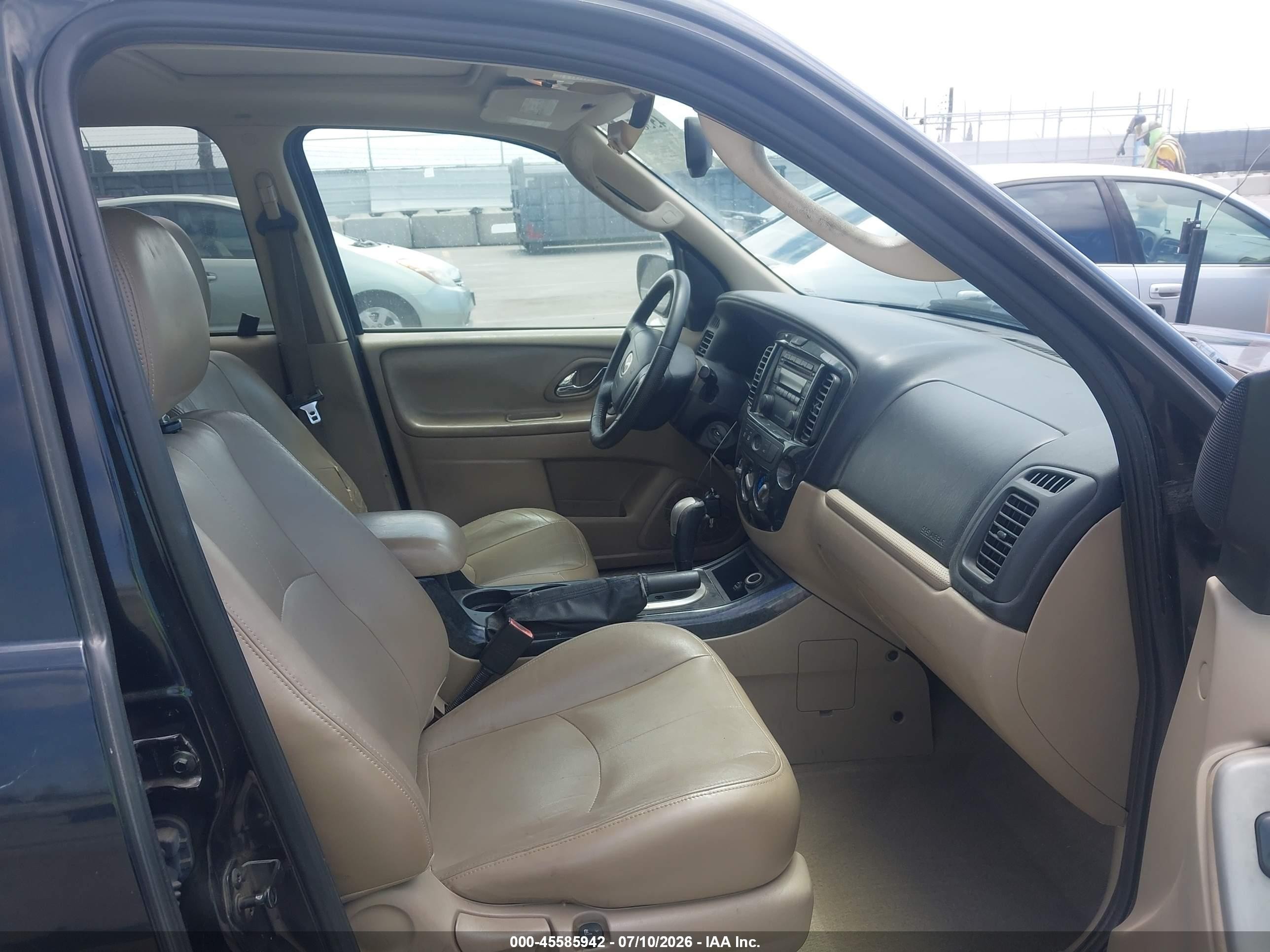 2006 Mazda Tribute S Синий vin: 4F2CZ06116KM02223