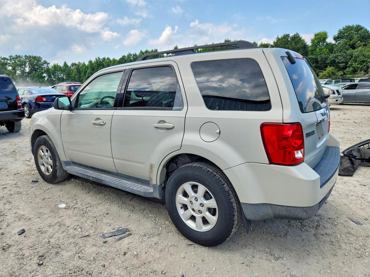 2009 Mazda Tribute S Желто-коричневый vin: 4F2CZ06G59KM02301