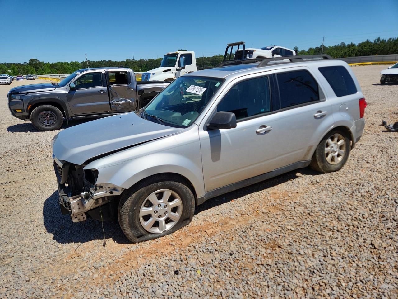 2009 Mazda Tribute S Серебряный vin: 4F2CZ06GX9KM00270