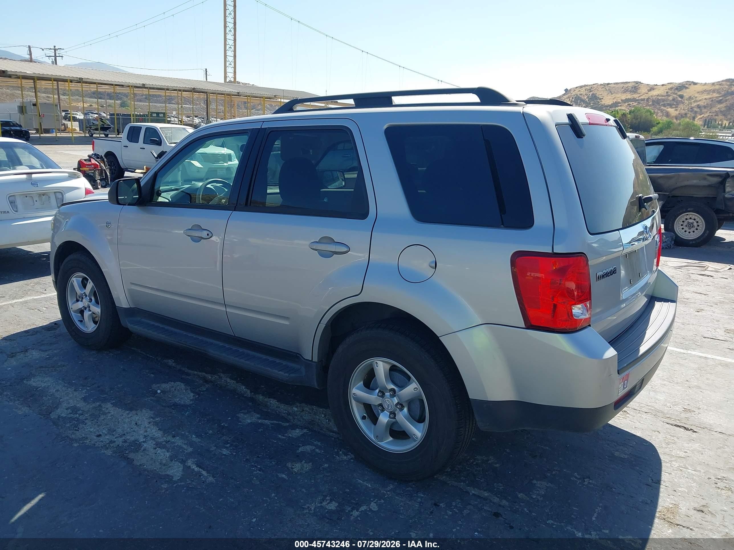 2009 Mazda Tribute Hybrid Touring Silver vin: 4F2CZ49389KM07816