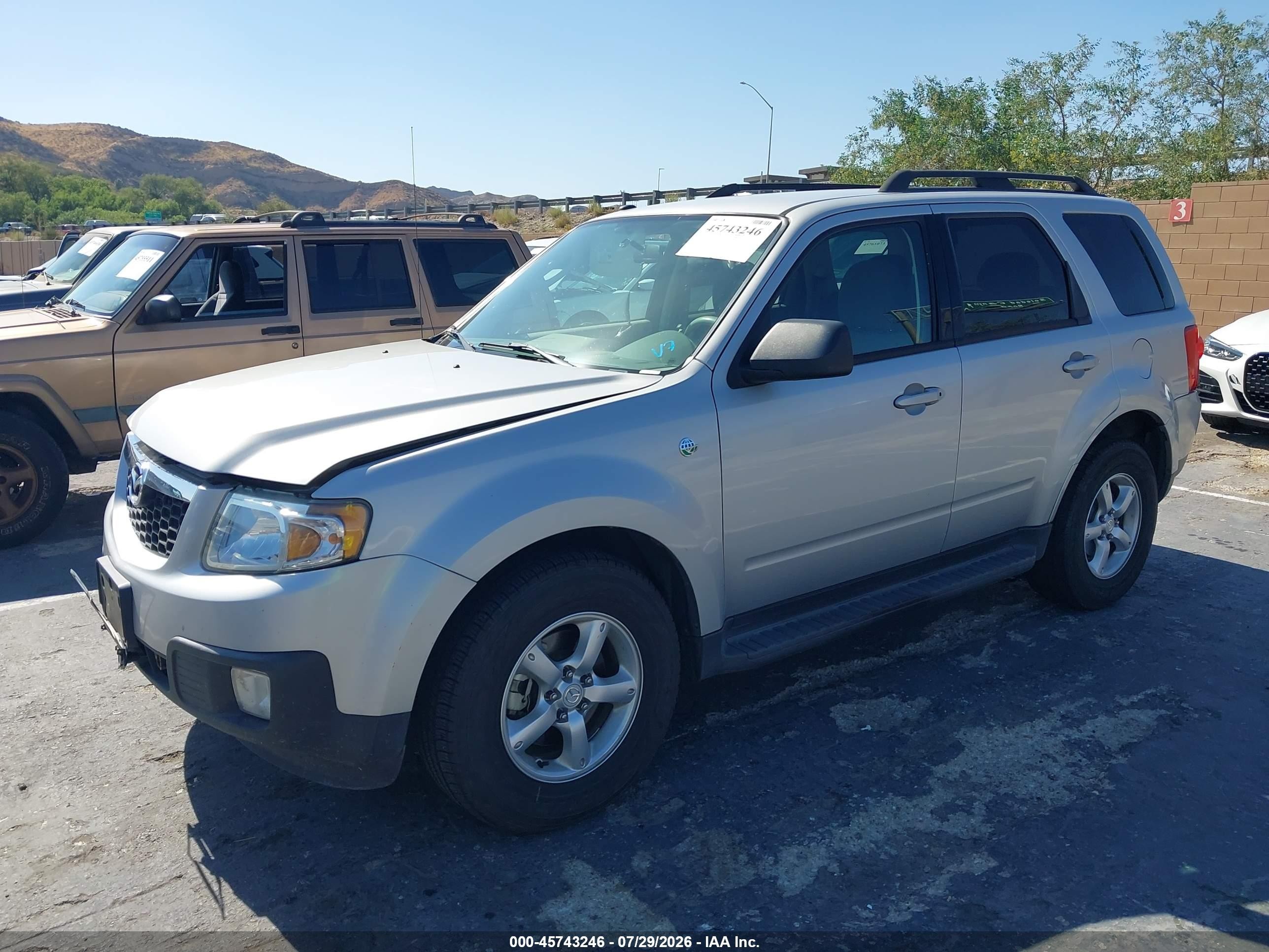 2009 Mazda Tribute Hybrid Touring Silver vin: 4F2CZ49389KM07816