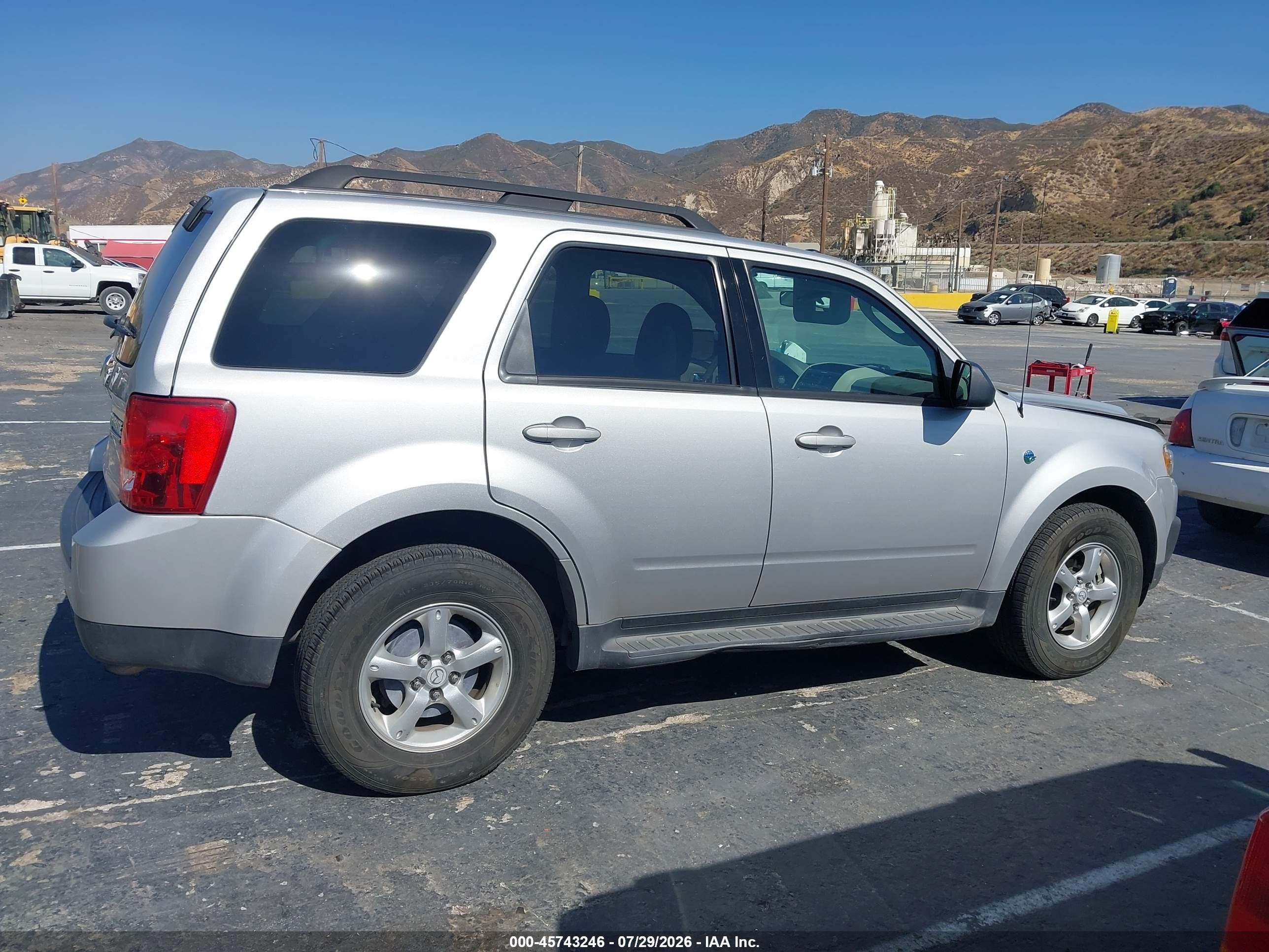 2009 Mazda Tribute Hybrid Touring Silver vin: 4F2CZ49389KM07816