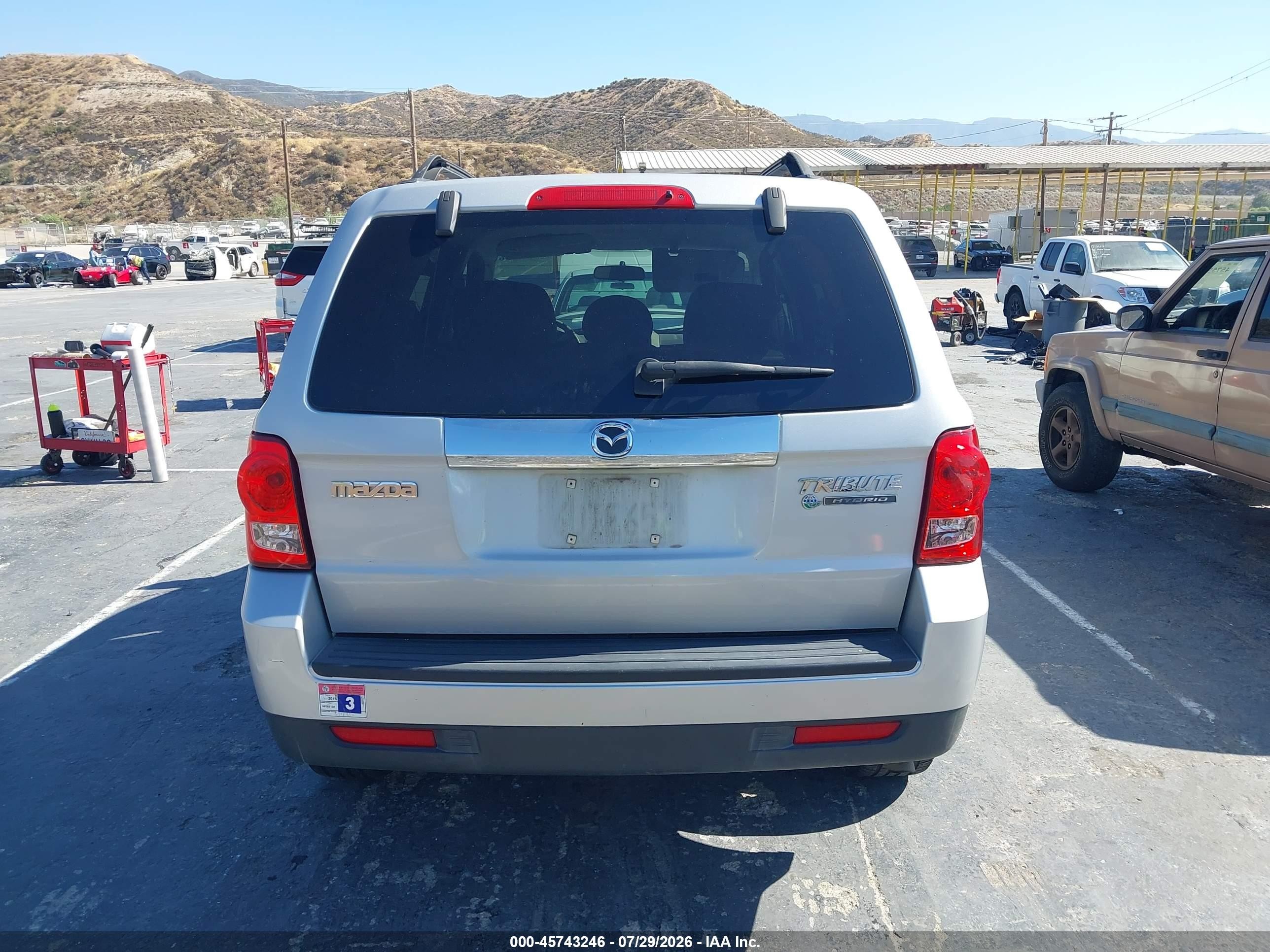2009 Mazda Tribute Hybrid Touring Silver vin: 4F2CZ49389KM07816