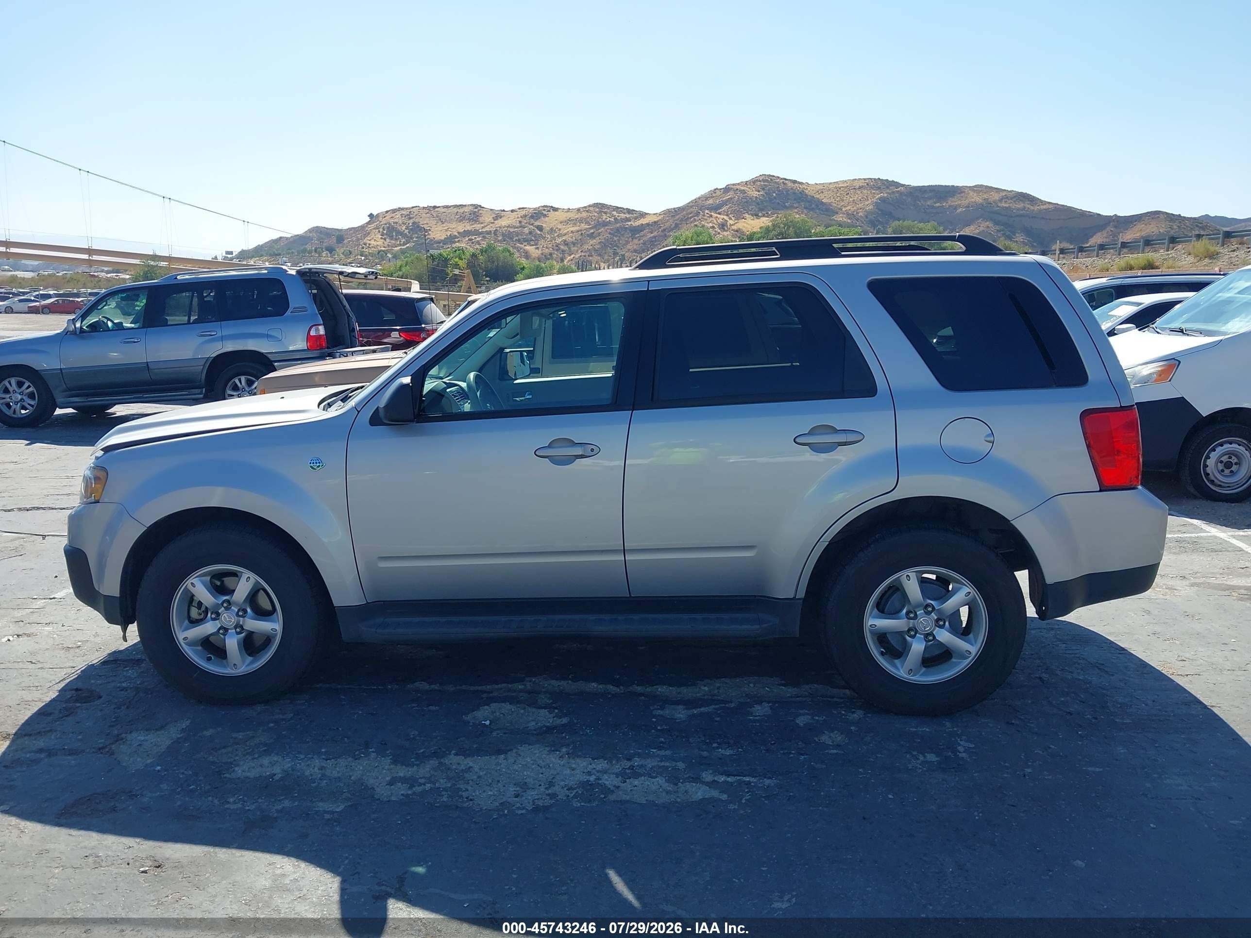 2009 Mazda Tribute Hybrid Touring Silver vin: 4F2CZ49389KM07816